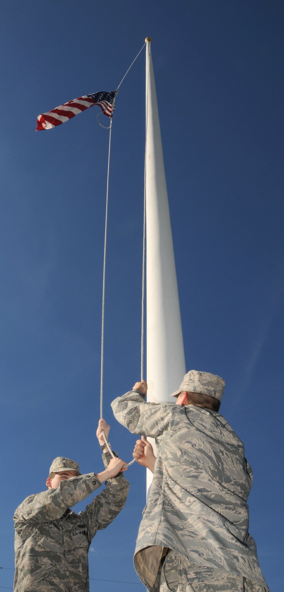 Members of the 103rd Communications Flight retire the American flag during a special flag-folding ceremony honoring 9/11 fallen and heroes at Bradley Air Park, Bradley Air National Guard Base, East Granby, Conn. Sept. 11, 2010. (U.S. Air Force photo by Tech. Sgt. Teddy Andrews)
