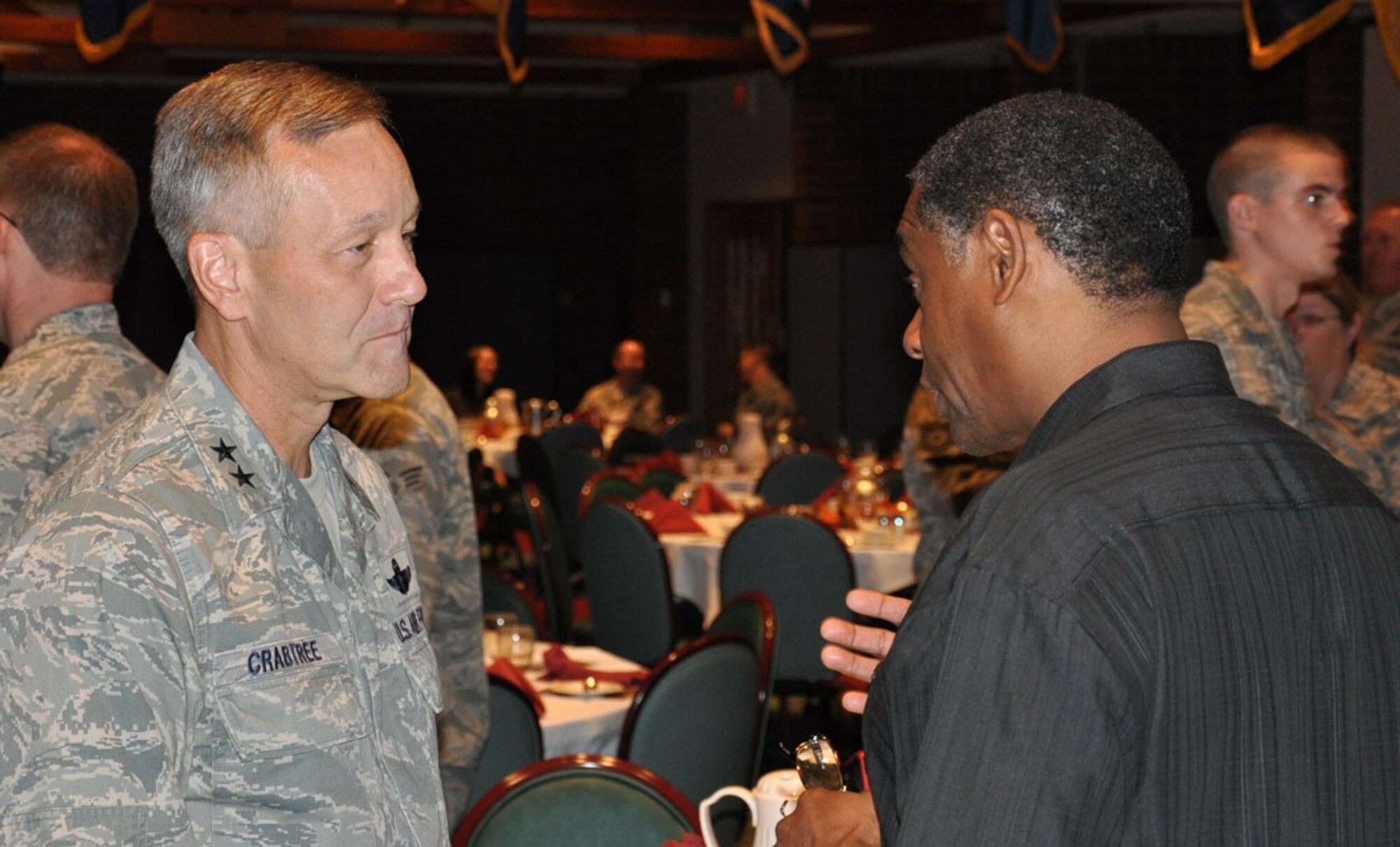 JOINT BASE LEWIS-MCCHORD, Wash.- Maj. Gen. Eric Crabtree, 4th Air Force commander, chats with retired Chief Master Sgt. Jerry Lewis after the Moosefest 2010 awards luncheon here, Oct. 2. Moosefest was founded out of a desire to honor those within the maintenance group who excel at their job. General Crabtree is the former 446th Airlift Wing commander. (U.S. Air Force Photo/Staff Sgt. Javier Cruz)