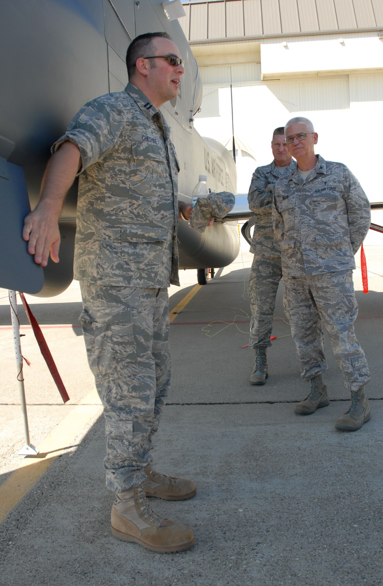 Col. William Willis Sr., Air Force Reserve Command deputy command chaplain, listens to a briefing on the capabilities of the RQ-4 Global Hawk from Capt. Christopher Cheshire with the 13th Reconnaissance Squadron, Oct. 2. Colonel Willis visited the 940th Wing to learn about the wing’s unique high-altitude intelligence, surveillance and reconnaissance mission and how they support the active duty host unit, 9th Reconnaissance Wing. (U.S. Air Force Photo by Tech. Sgt. Luke Johnson)