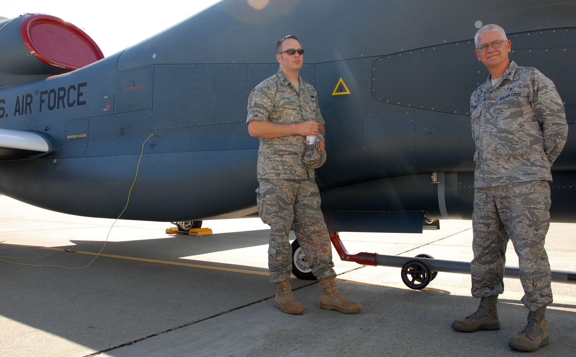 Col. William Willis Sr., Air Force Reserve Command deputy command chaplain, listens to a briefing on the capabilities of the RQ-4 Global Hawk from Capt. Christopher Cheshire with the 13th Reconnaissance Squadron, Oct. 2. Colonel Willis visited the 940th Wing to learn about the wing’s unique high-altitude intelligence, surveillance and reconnaissance mission and how they support the active duty host unit, 9th Reconnaissance Wing. (U.S. Air Force Photo by Tech. Sgt. Luke Johnson)