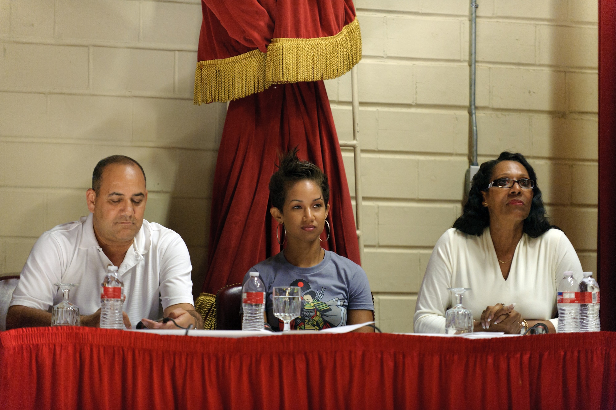 March Idol judges -- Master Sgt. Medhat Dawood, Butterscotch and Senior Master Sgt. Ionne Barnes-Joshua (U.S. Air Force photo by Staff Sgt. Matthew Smith)