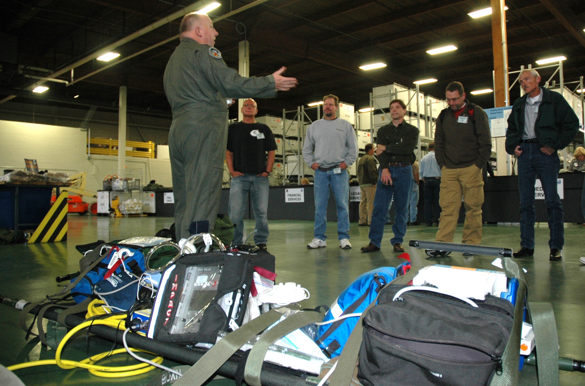 JOINT BASE LEWIS-MCCORD, Wash. -- Lt. Col. Ken Winslow, a flight nurse with the 446th Aeromedical Evacuation Squadron, explains how employer support for Reservists is critical toward their mission. Civilian employers from the Northwest region arrived at the crack of dawn to participate in the bi-annual Employer Orientation Day, Oct. 2.  (U.S. Air Force photo/Staff Sgt. Elizabeth Moody)