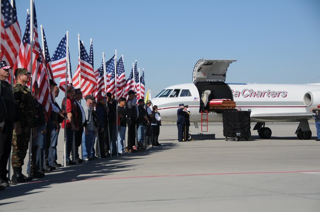 The body of Chief Warrant Officer 3 Matthew G. Wagstaff arrives at the Utah Air National Guard base in Salt Lake City, Utah, on October 3, 2010. CW3 Wagstaff was a UH-60 Blackhawk pilot who died in Afghanistan September 21. He was serving on his third deployment at the time. (U.S. Air Force photo by Master Sergeant Gary J. Rihn)(RELEASED)
