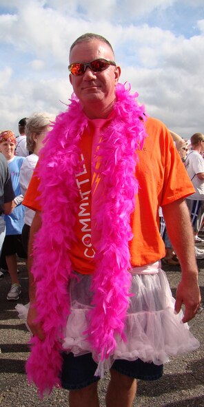 Chief Master Sergeant (select) Bill Angstadt from the 184th IntelligenceWing, McConnell AFB, Kansas sports a pink tutu at Wichita's record-breakingRace for the CureR, Saturday September 25th.  As a year-long event planningcommittee member, Angstandt vowed to wear a tutu at the race if Wichitabroke into the 10,000 participant mark.  The event also set fundraisingrecords, currently in excess of $170,000  towards the fight against breastcancer.  Angstadt headed the 184th effort to provide assistance manningintersections, providing handicapped parking and providing communicationequipment.