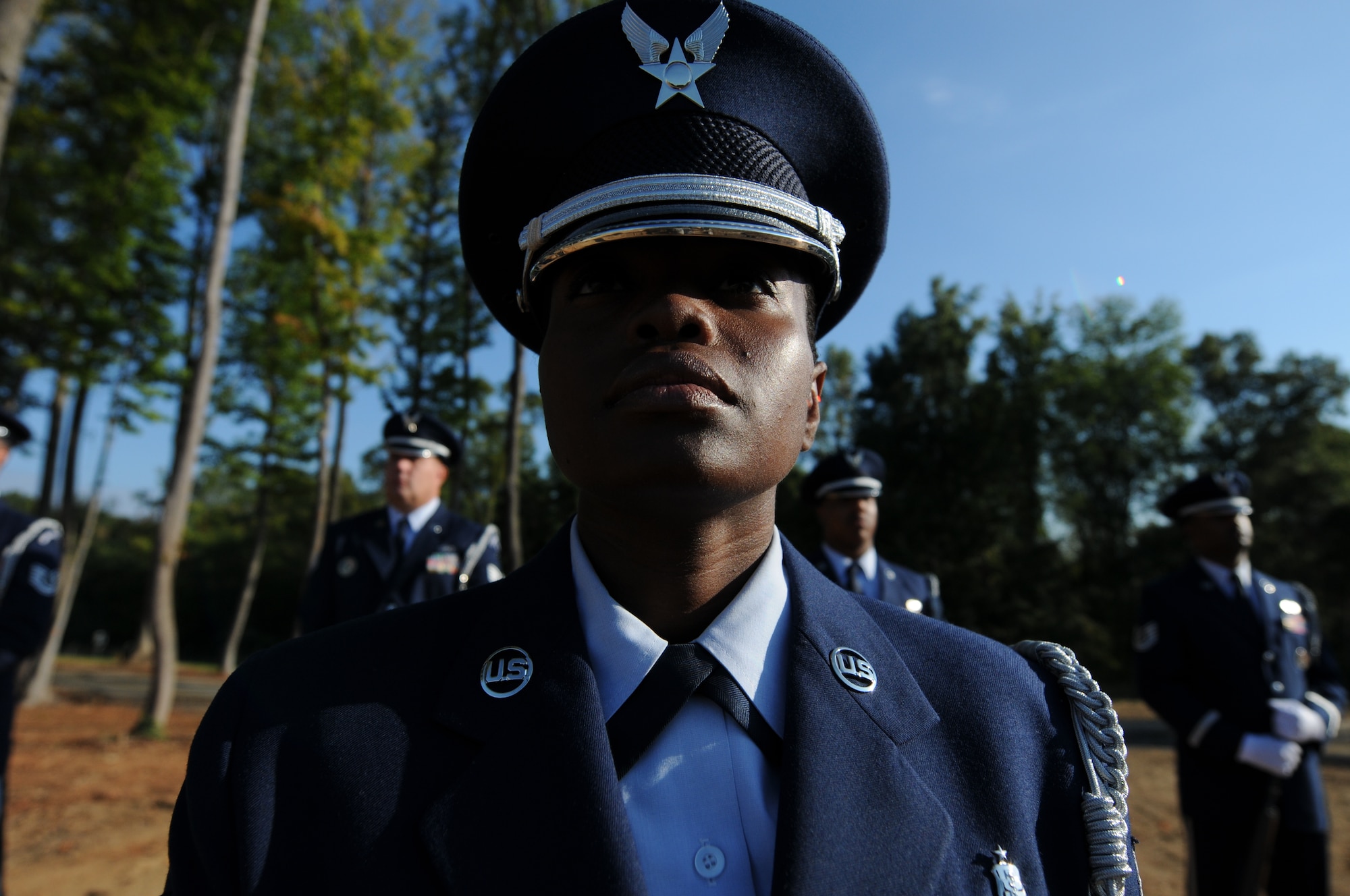 Charlotte, N.C. -- Tech. Sgt. Sheryl Bell of the 145th Airlift Wing honor guard stands at ease during the memorial service honoring North Carolina Air National Guardsmen deceased within the last year. (NCANG photo by Tech. Sgt. Brian E. Christiansen)