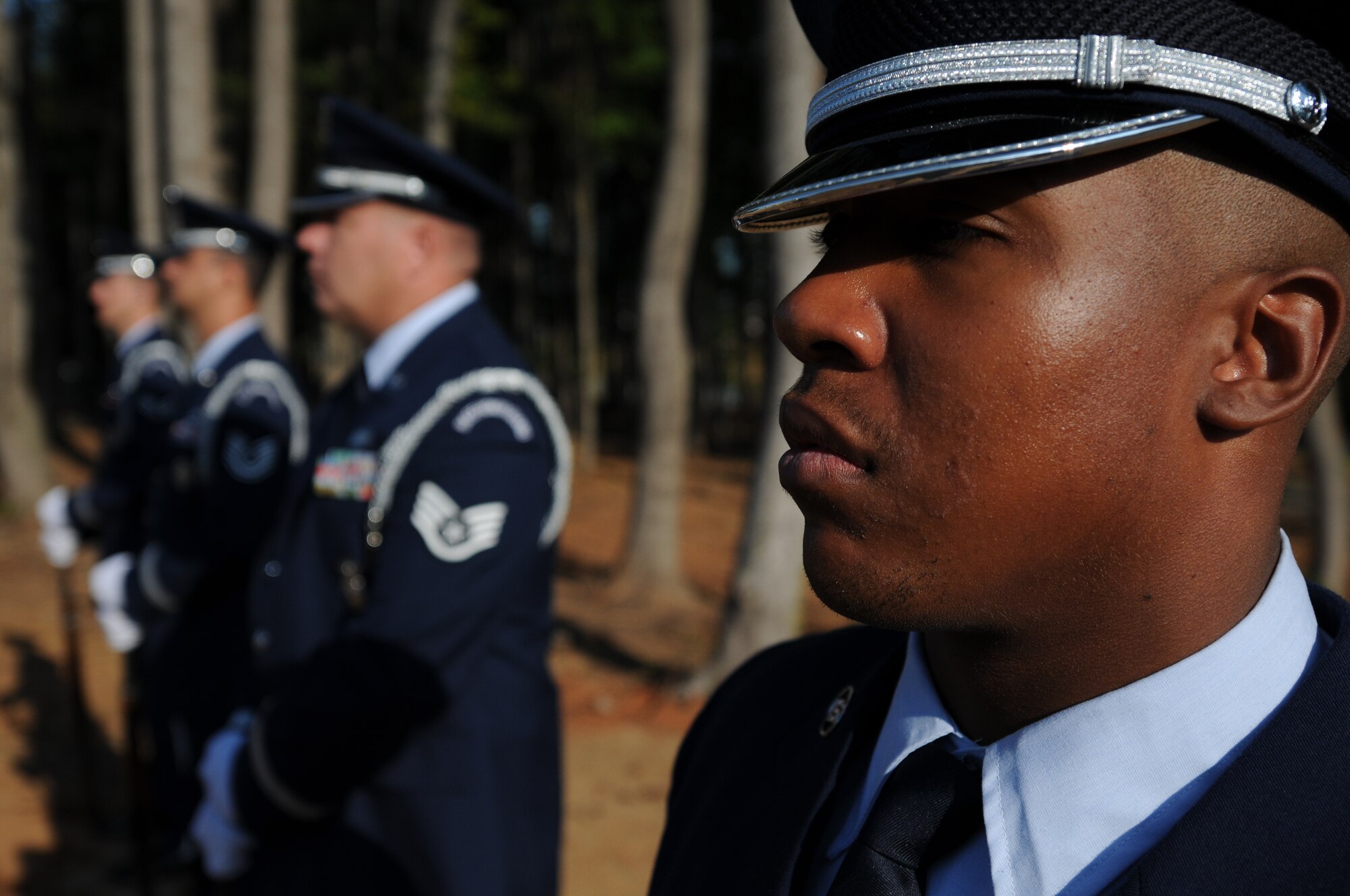 Charlotte, N.C. -- Airmen of the 145th Airlift Wing Honor Guard stand-by at the memorial service honoring North Carolina Air National Guardsmen deceased within the last year. (NCANG photo by Tech. Sgt. Brian E. Christiansen)