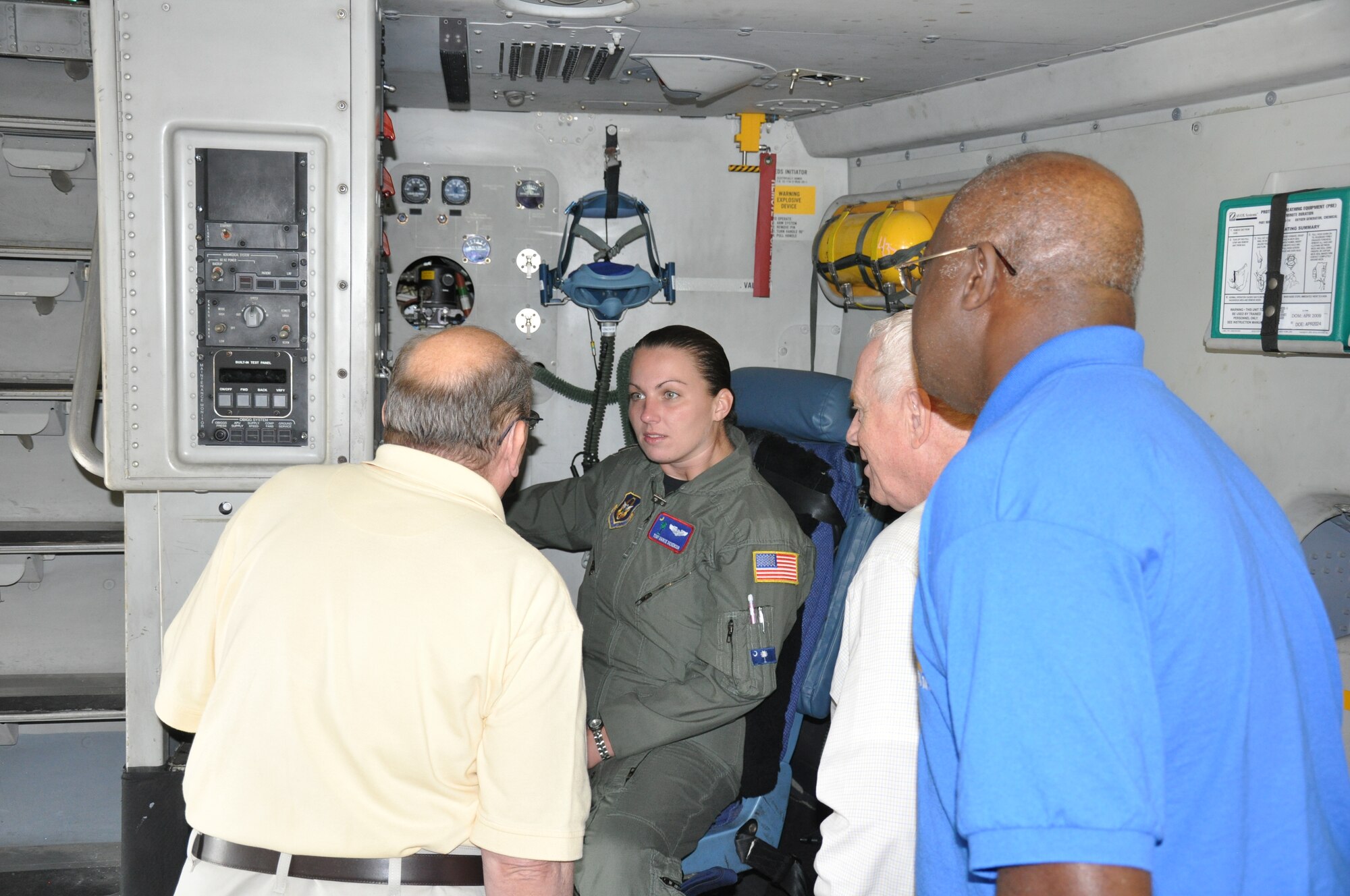 Tech. Sergeant Marcie Dickerson, loadmaster with the 701st Airlift Squadron, Charleston Air Force Base, S.C. explaines the features of the C-17 to a group with the Reserve Air Transportion Reunion. The reunion was held Saturday Oct. 2 included mission breifings from 315th AW and 81st APS senior leaders and a banquet Saturday night.