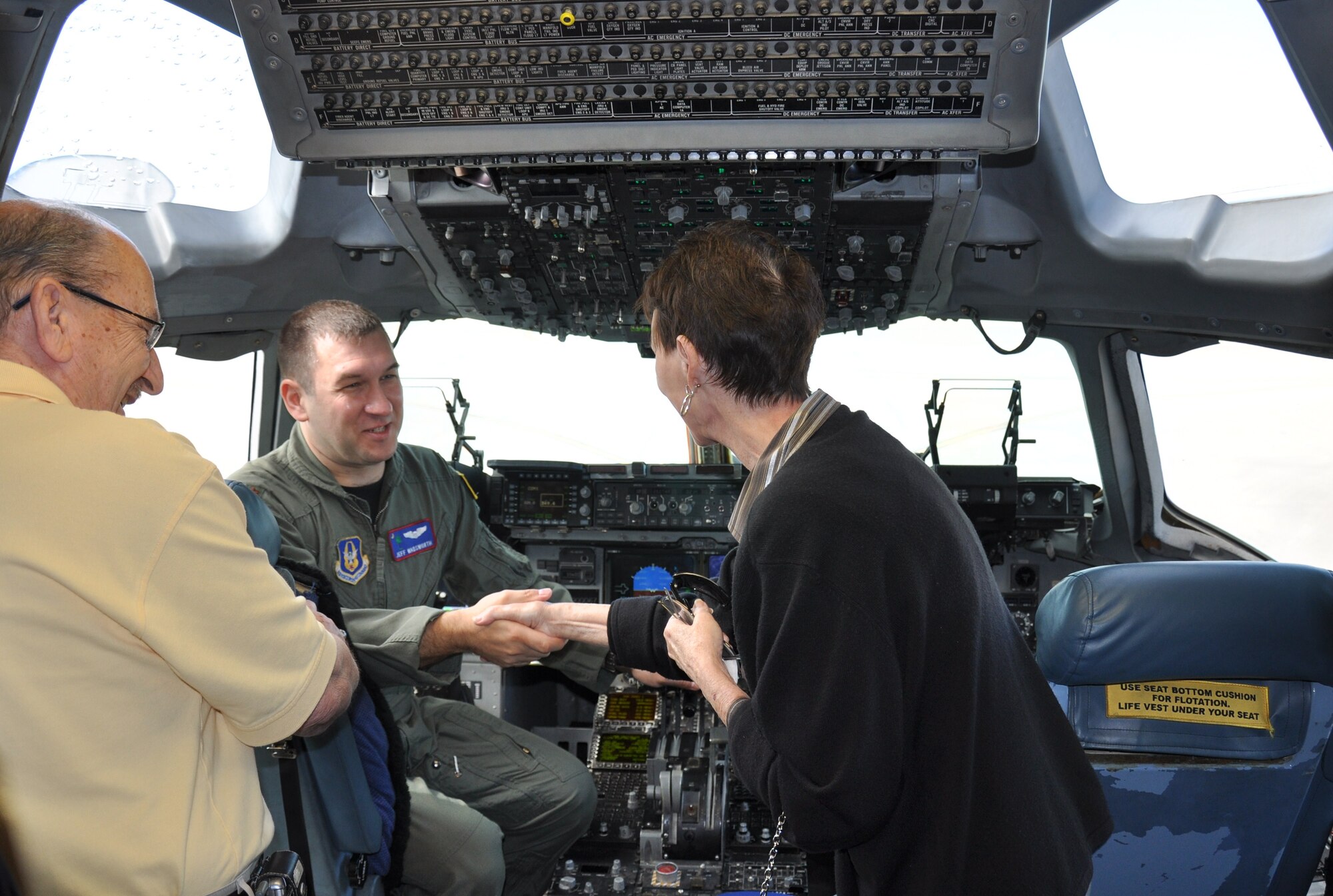 Major Jeff Wadsworth, pilot with the 701st Airlift Squadron Charleston Air Force Base, South Carolina, meets greets visitors touring a C-17 here Oct. 2. The 315th Airlift Winghosted the third Reserve Air Transportation Reunion over the unit training assembly weekened.