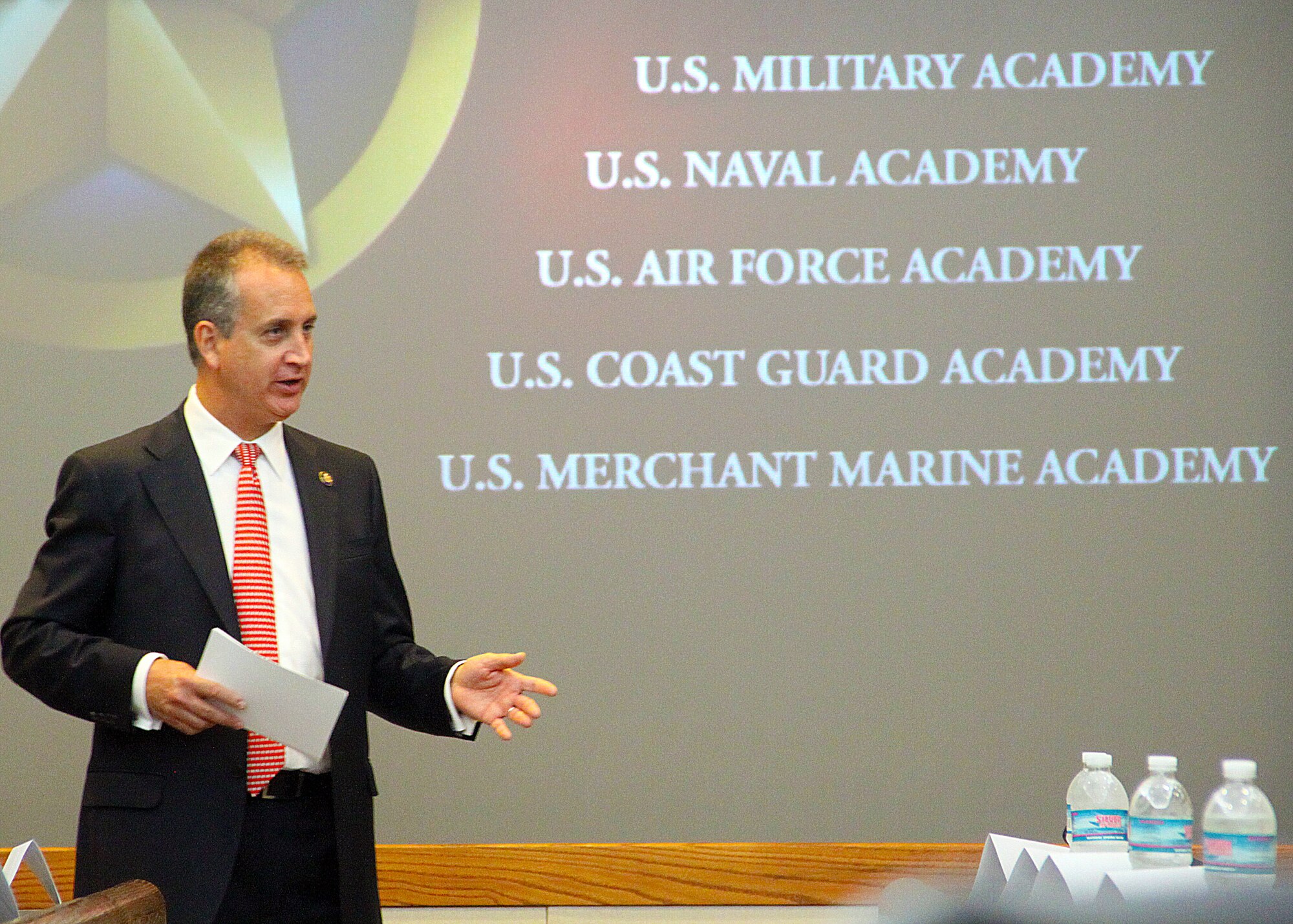 Congressman Mario Diaz-Balart, Florida 25th District, adresses school students, parents and ROTC and Civil Air Patrol Cadets during Service AcademyDay, Oct. 1, at Homestead Air Reserve Base. The students met with representatives from the Air Force, Coast Guard, U.S. Military, Naval and Merchant Marine academies at the Heritage Hall Training and Conference Center to discuss and learn about the educational and career opportunities available at the respective academies. The event was hosted by the congressman (U.S. Air Force photo/ Tech. Sgt. Ian Carrier)