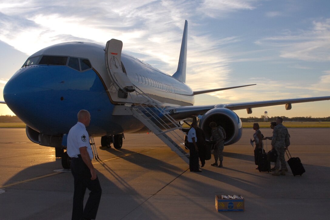 Air Force Reserve Command maintenance members prepare the 932nd Airlift Wing's C-40C aircraft for an early morning flight.  The Illinois flying unit has three of the planes at Scott Air Force Base.  (U.S. Air Force photo/Maj. Stan Paregien)
