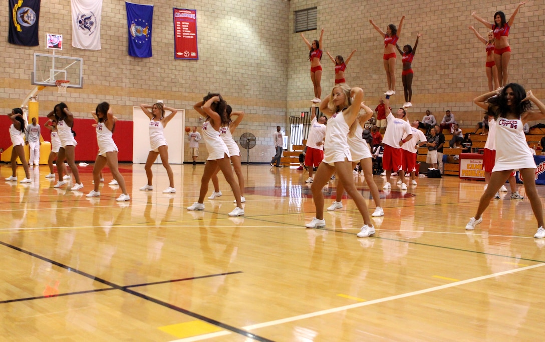 The Los Angeles Clippers cheerleaders and spirit team put on a show for base residents at a scrimmage game at Marine Corps Base Camp Pendleton’s Paige Field house, Oct. 3. The girls’ routine involved a dance and various gymnastics moves.