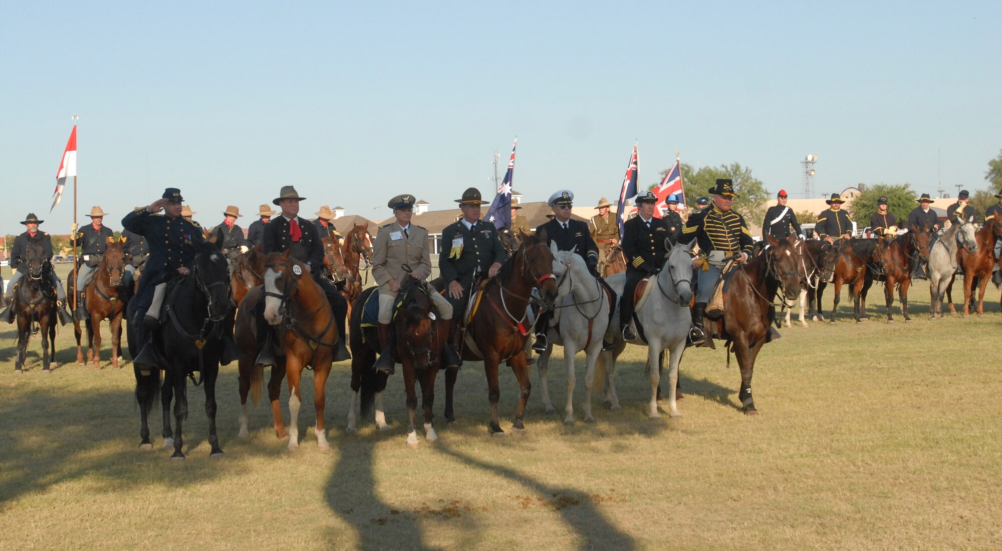 Participants of the U.S. Cavalry Association’s National Cavalry Competition line up in front of the reviewing stand at Fort Concho Historic Landmark Oct. 2.  The USCA is dedicated to the preservation of the history, traditions, uniforms and equipment of the United States cavalry units. (U.S. Air Force photo/Kent Cummins)