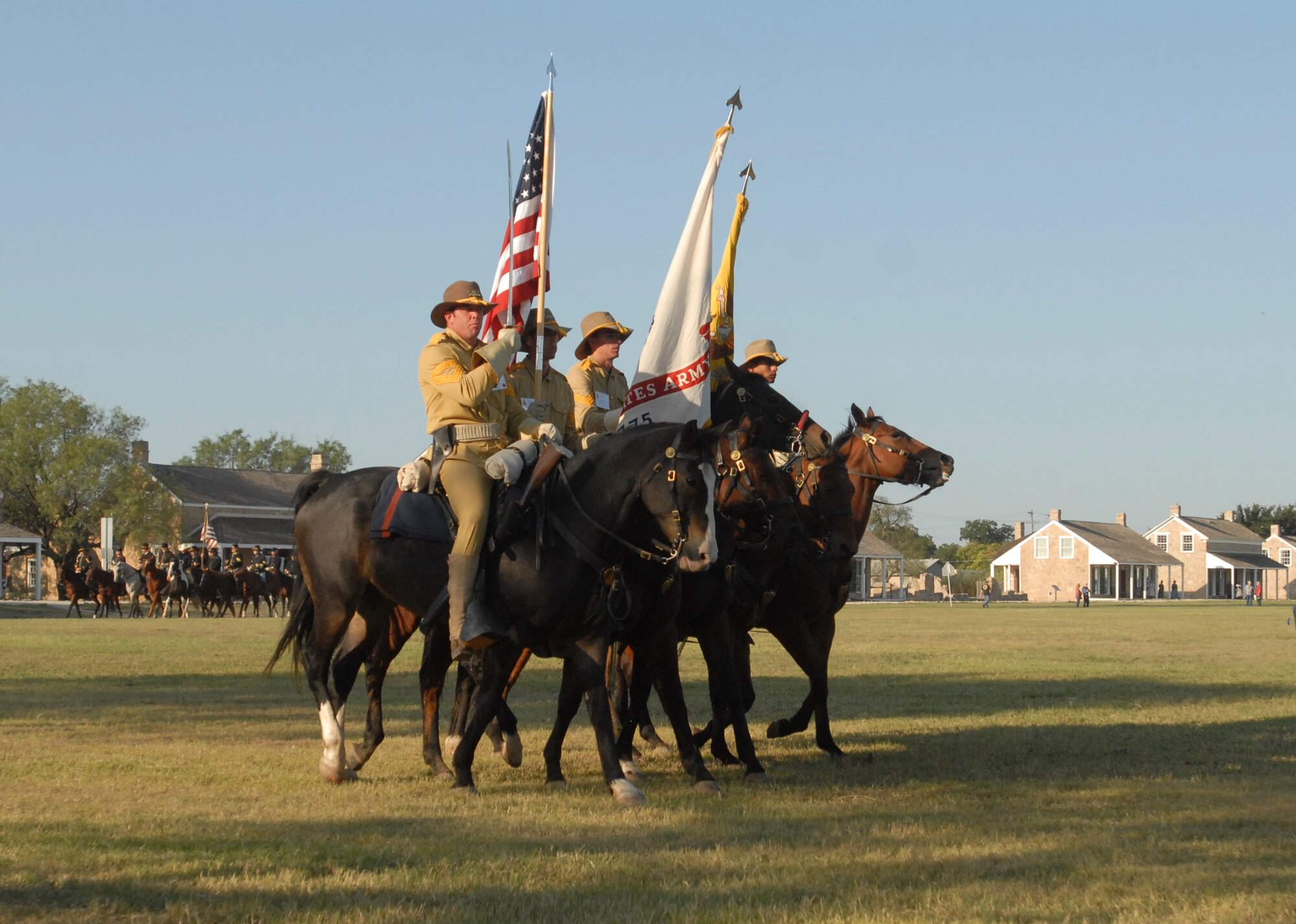 National Cavalry Competition riders take part in a parade and opening ceremony at Fort Concho Historic Landmark Oct. 2.  The U.S. Cavalry Association’s National Cavalry Competition promotes good horsemanship and provides an opportunity for re-enactors, active and reserve military mounted color guards, and mounted police officers to compete and improve their riding skills. (U.S. Air Force photo/Kent Cummins)
