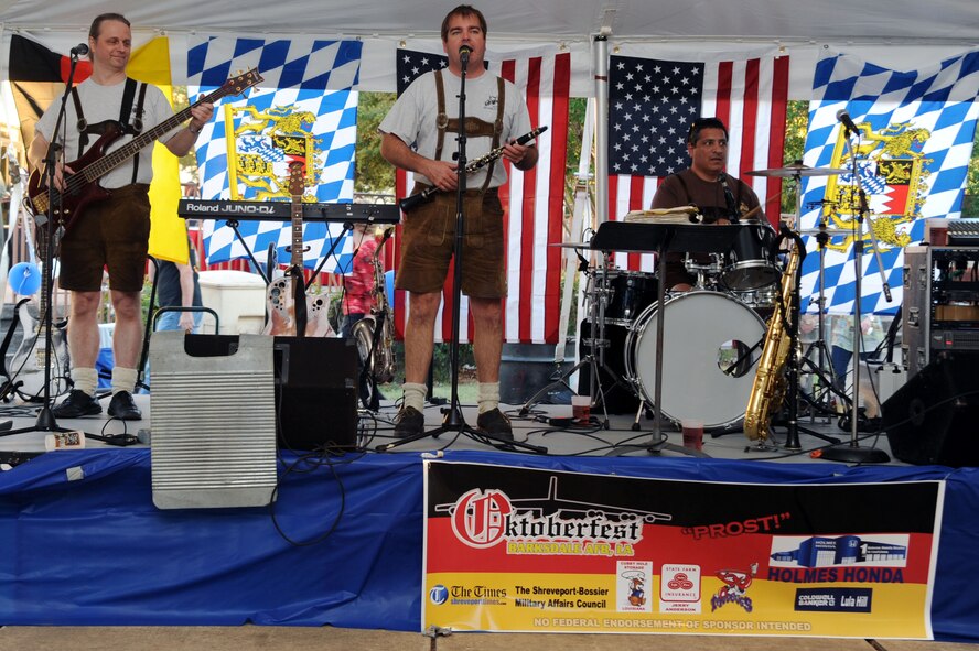 BARKSDALE AIR FORCE BASE, La. --The Alpen-Musikanten band performs during Oktoberfest Oct.1. The group of musicians is made up of two German-Americans, Alan, and Clay; two Austrians, Manfred and Wolfgang and a Norwegian-American, Gordon. (U.S. Air Force photo/Senior Airman Brittany Y. Bateman)(RELEASED) 