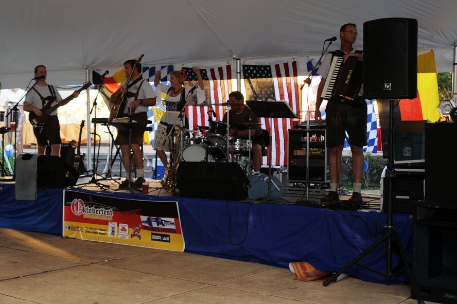 BARKSDALE AIR FORCE BASE, La. -- The Alpen-Musikanten band performs during Oktoberfest Oct.1. The group of musicians is made up of two German-Americans, Alan, and Clay; two Austrians, Manfred and Wolfgang and a Norwegian-American, Gordon. (U.S. Air Force photo/Senior Airman Brittany Y. Bateman)(RELEASED)