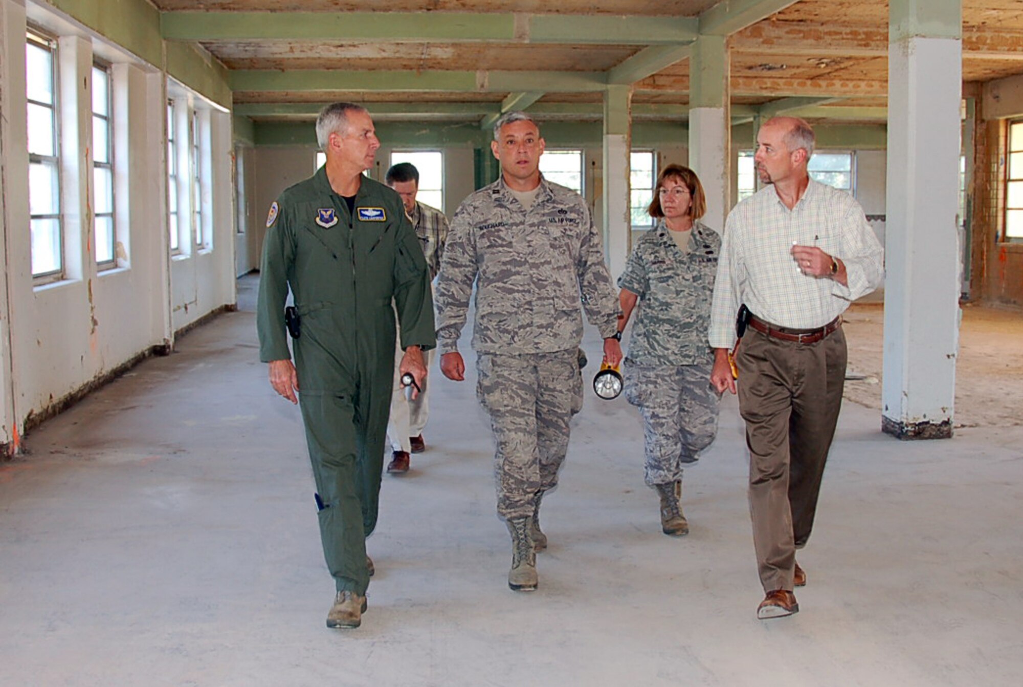 BARKSDALE AIR FORCE BASE, La. – Maj. Gen. Floyd Carpenter, Eighth Air Force commander, get s a tour of renovations going on inside Building 5354 from Darin Bailey, NAVFAC southeast resident engineer. A groundbreaking ceremony commemorating the $25 million renovation project was held Oct. 4. The renovations cover more than 77,000 square feet of office space and will transform the building built in 1934 into a 21st Century warfighting headquarters for Eighth Air Force. (U.S. Air Force photo by Maj. Richard Komurek)