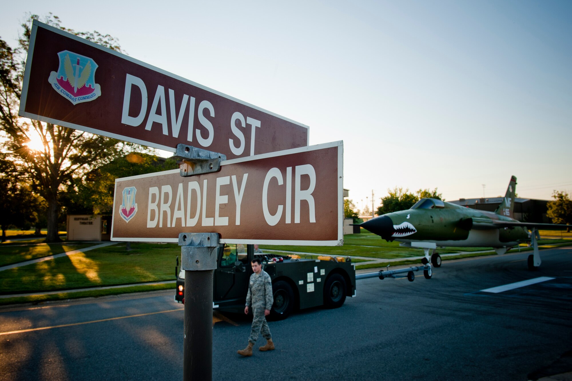 MOODY AIR FORCE BASE, Ga. -- Members of the 23rd Equipment Maintenance Squadron maintenance flight tow an F-105 Thunderchief down Davis Street Oct. 3. The 23rd Tactical Fighter Wing flew F-105s from 1964 to 1972. Moody’s Heritage Park will serve as a final resting spot for the aircraft. (U.S. Air Force photo/Senior Airman Jamal D. Sutter)