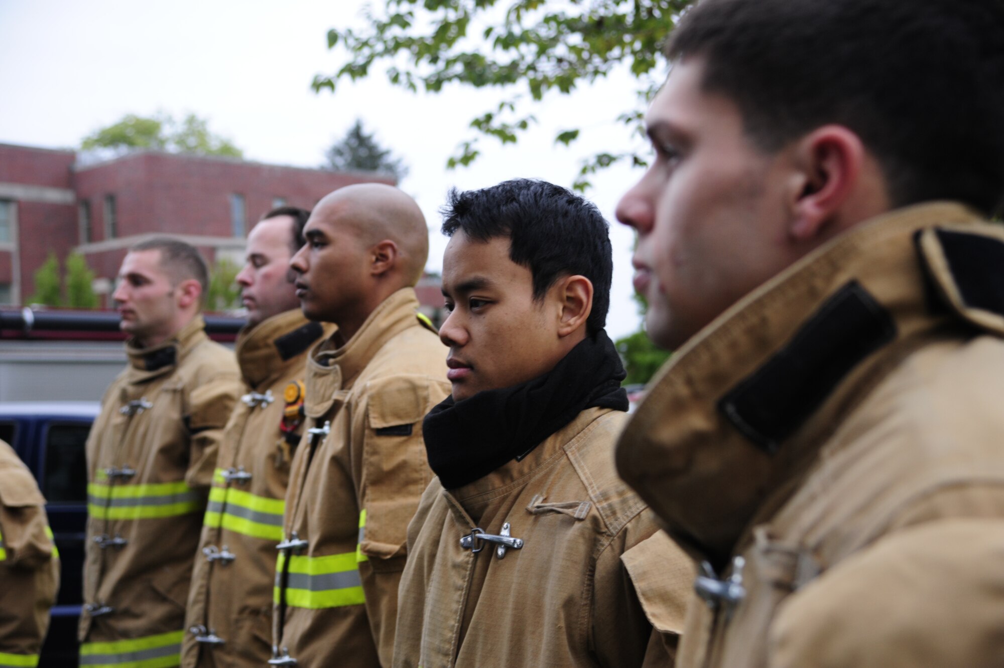 Firefighters from the 627th Air Base Group participate in a ceremony honoring National Fallen Firefighters Memorial Weekend Oct. 3 at Joint Base Lewis-McChord, Wash. (U.S. Air Force Photo/Airman Leah Young)