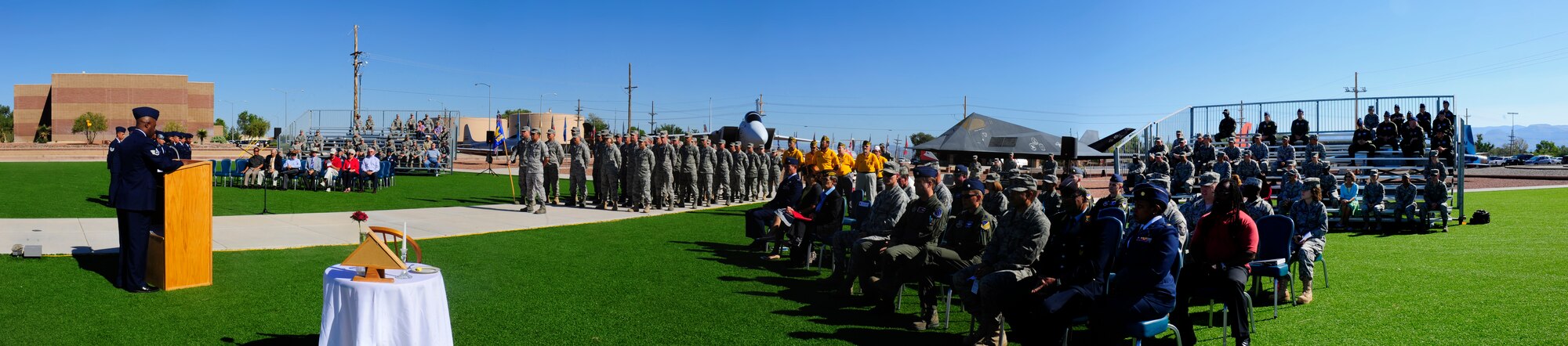 HOLLOMAN AIR FORCE BASE, N.M. -- Members of Team Holloman and the Alamogordo community honor prisoners of war and individuals missing in action during a POW/MIA Remembrance Ceremony Sept. 30, 2010. Each year, Team Holloman pays tribute to the American men and women of the armed forces who are MIA as well as POW servicemembers who faced suffering in distant lands. (Photo Illustration by Senior Airman Tiffany Trojca / Released)