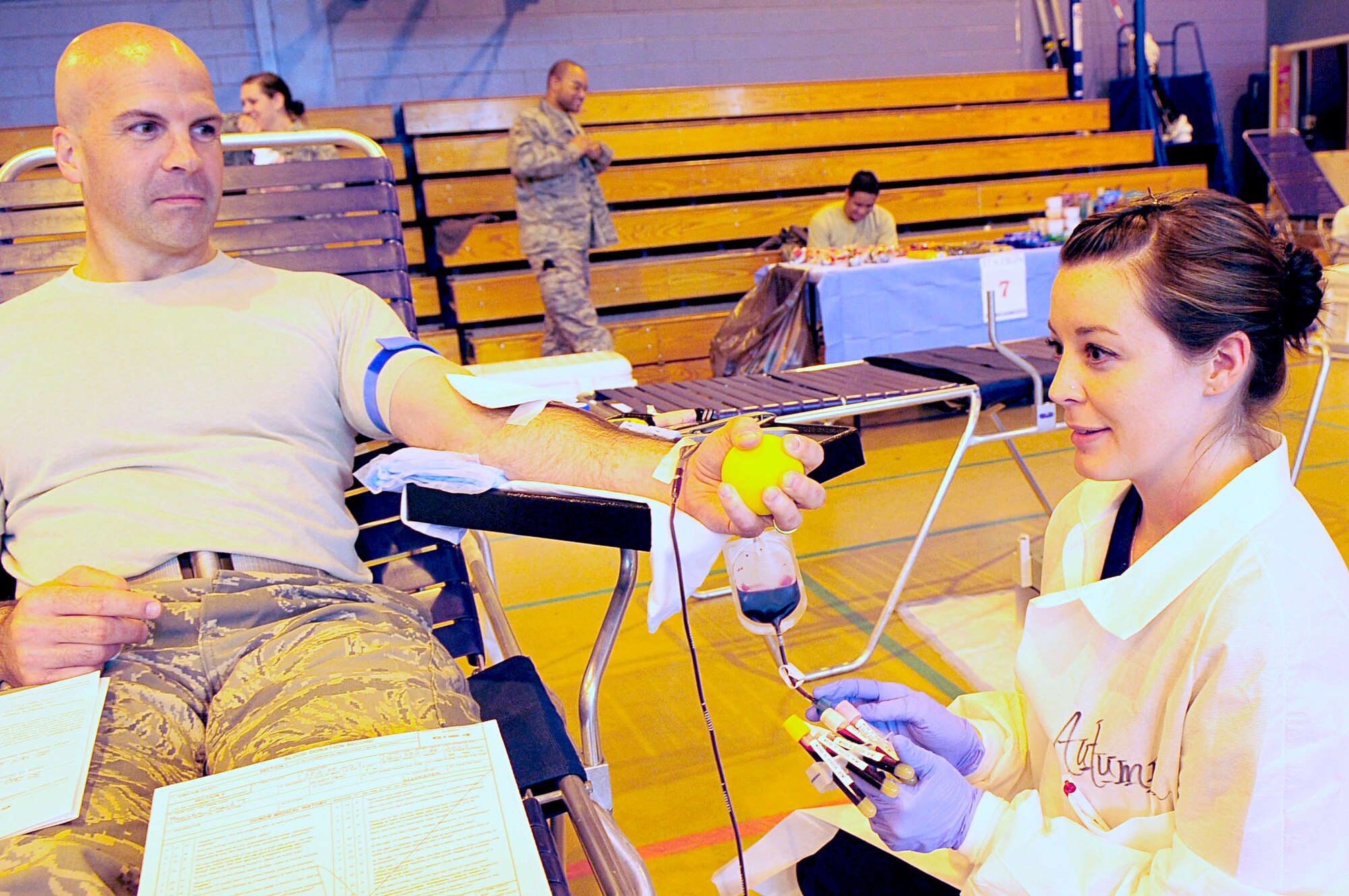 RAF MILDENHALL, England -- Col. Chad Manske, 100th Air Refueling Wing commander, donates blood while assisted by an Armed Services Blood Program medical lab technician at the blood drive here Sept. 30. Many people took time out of their busy schedules to donate blood and said they intend on doing so again when ASBP returns in the spring of 2011. (U.S. Air Force photo/Senior Airman Ethan Morgan)