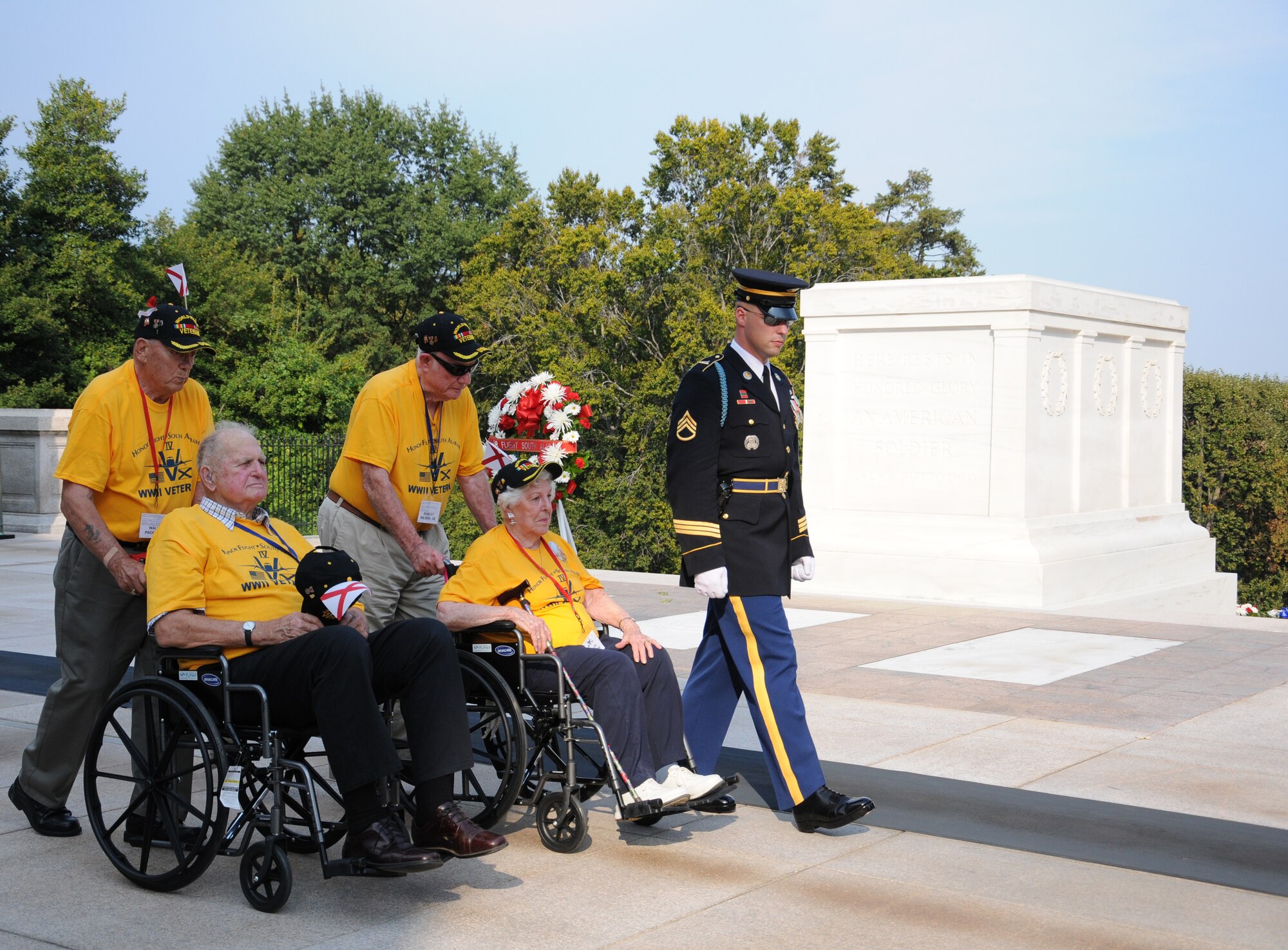 ARLINGTON NATIONAL CEMETERY, Va. -- WWII veterans participate in the Changing of the Guard cermony at the Tomb of the Unknown Soldier here Sept. 22.  The veterans were able to tour the cemetery and Washington, DC, memorials through a free service provided by the Honor Flight Network, which is primarily supported by donations and volunteer efforts.  (U.S. Air Force photo/Tech. Sgt. Steve Lewis)