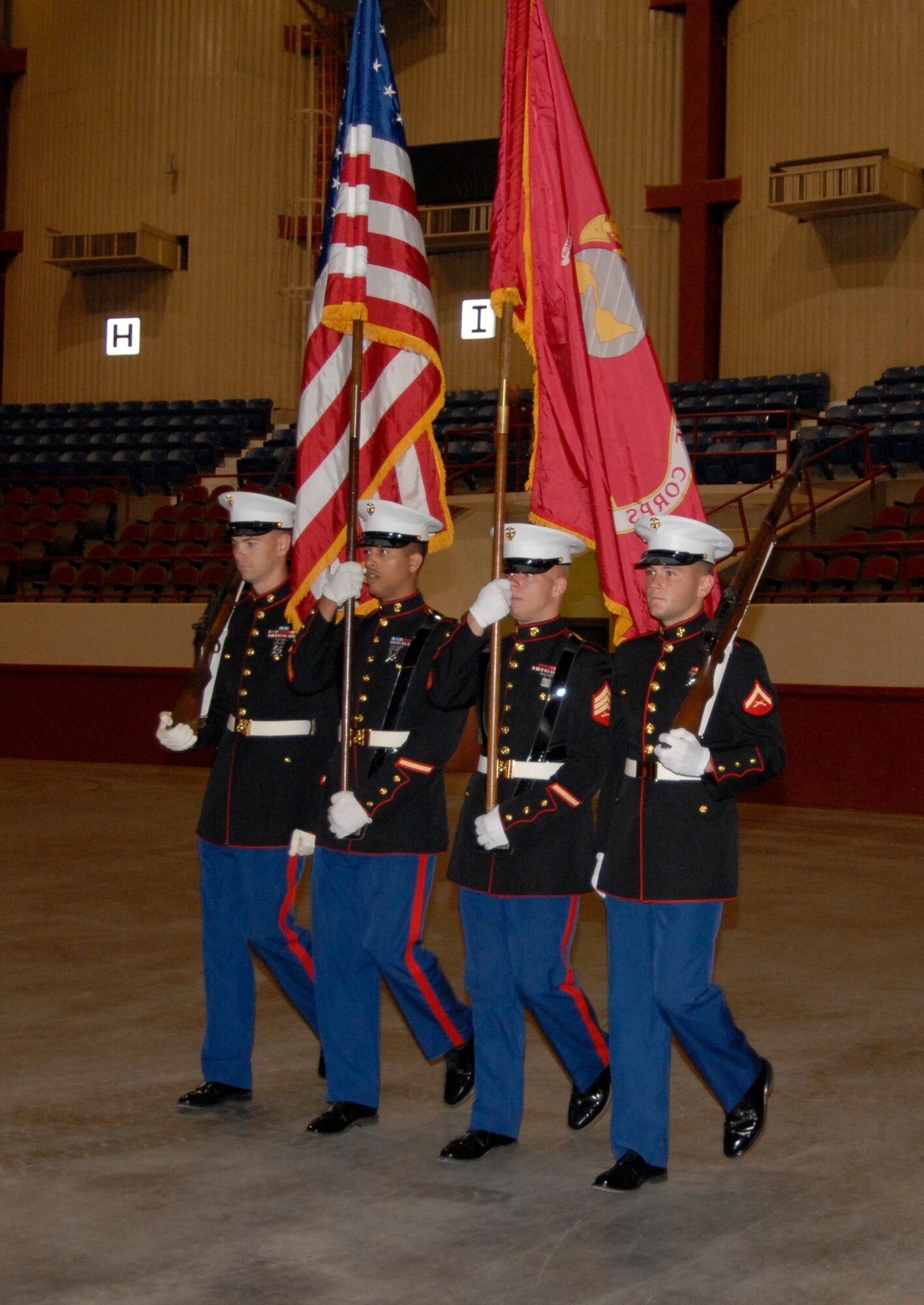 GOODFELLOW AIR FORCE BASE, Texas - The Marine Color Guard post the Colors during the Red Ribbon Week observance Sept. 29 at the San Angelo Coliseum. Students from the local community pledged to live a drug-free life and paid tribute to Drug Enforcement Administration Special Agent Enrique "Kiki" Camarena, who was kidnapped, tortured and murdered in 1985. (U.S. Air Force photo/Airman 1st Class Anne Gathua)