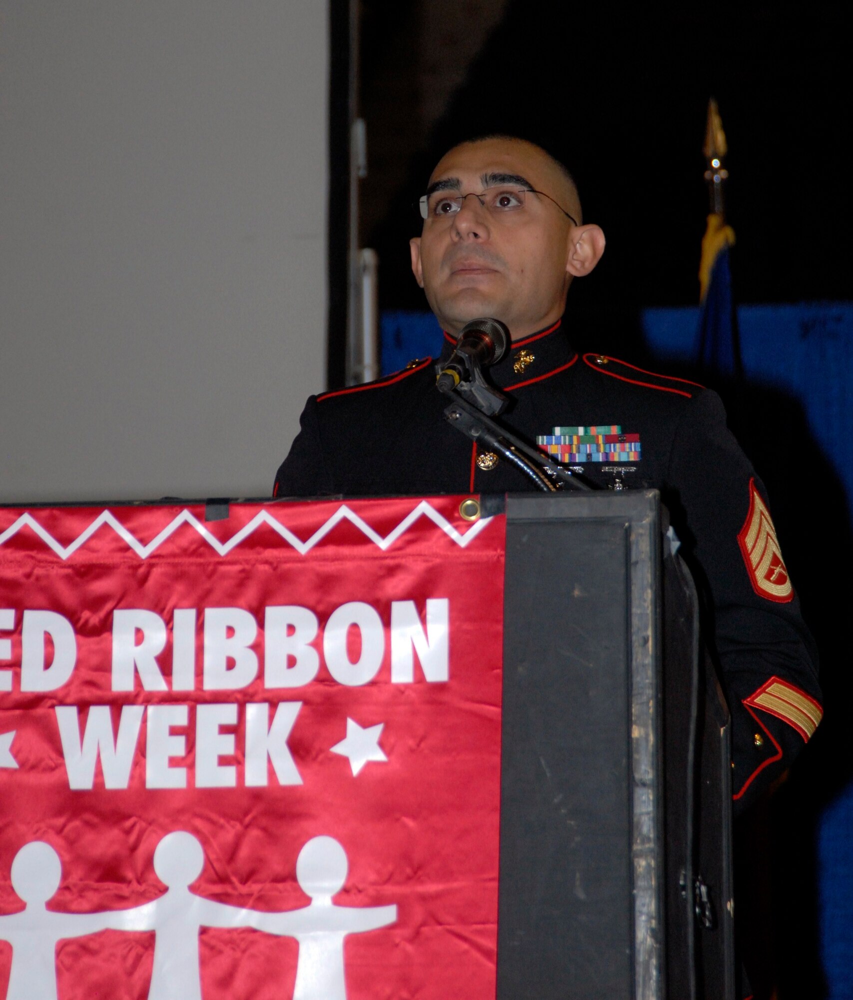 GOODFELLOW AIR FORCE BASE, Texas - Marine Staff Sgt. Samuel Castro, Marine Corps Detachment, gives a speech about the significance of Red Ribbon Week during an observance Sept. 29 at the San Angelo Coliseum. Students from the local community gathered in the coliseum pledging to live a drug-free life and to pay tribute to Drug Enforcement Administration Special Agent Enrique "Kiki" Camarena, who was a former Marine. (U.S. Air Force photo/Airman 1st Class Anne Gathua)