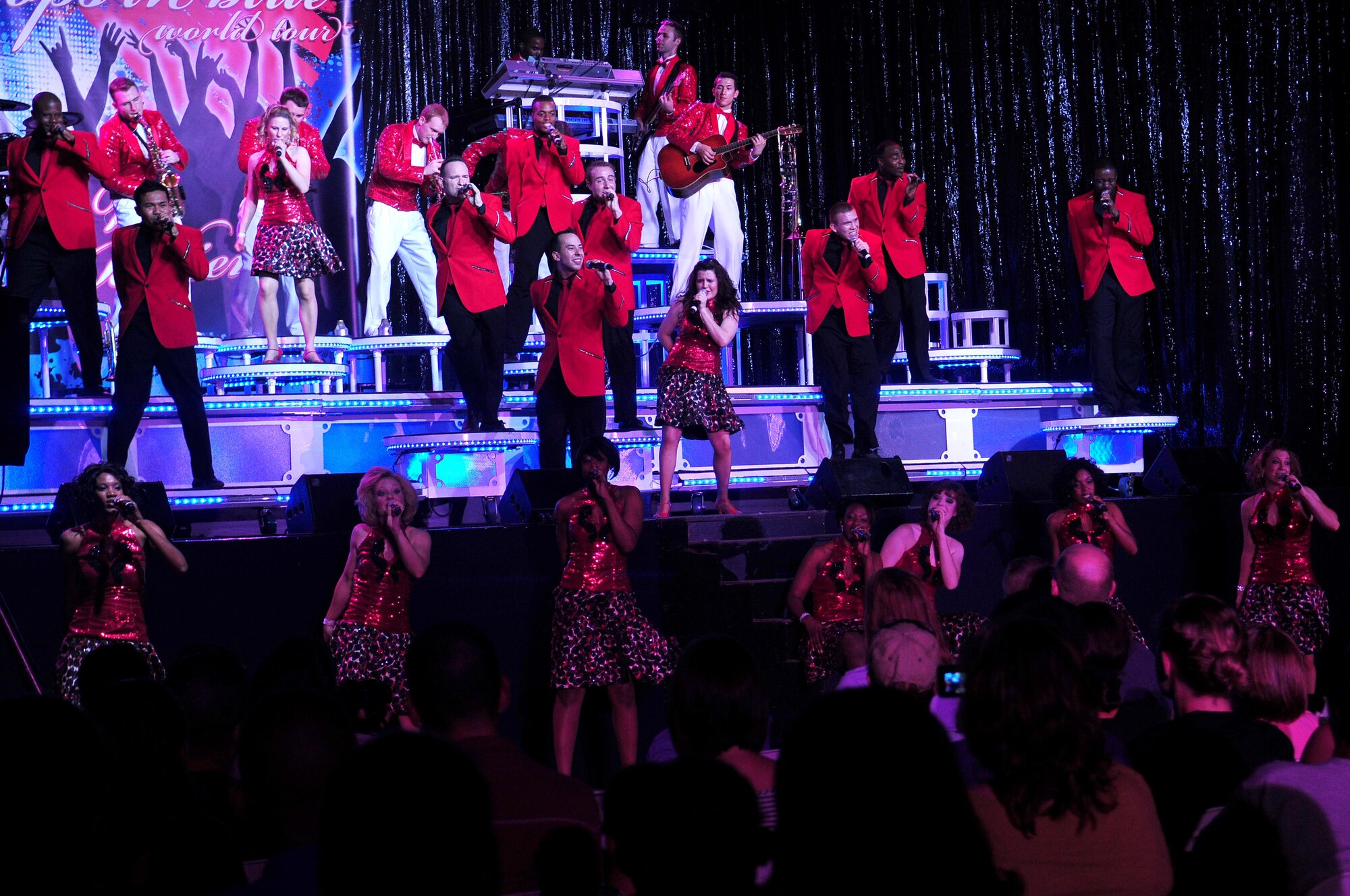 Tops in Blue musicians sing and dance Oct. 1, 2010 at Incirlik Air Base, Turkey during the Tops in Blue 2010 world tour entitled “We Believe.”  The team’s 2010 schedule will provide musical entertainment for servicemembers and their families throughout the U.S and 25 other countries with close to 140 performances.   (U.S. Air Force photo by Senior Airman Ashley Wood/Released)