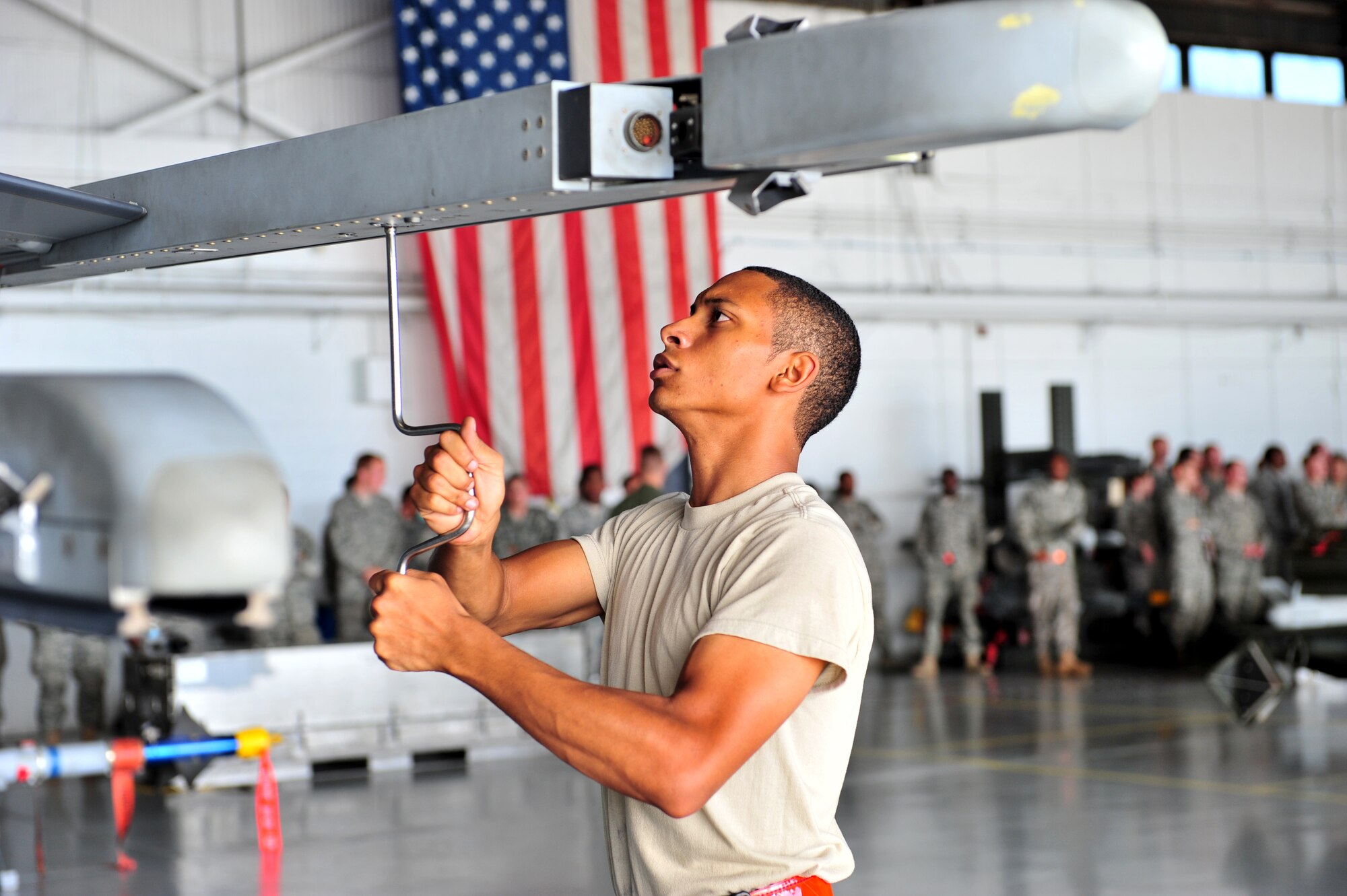 101001-F-8430J-040
SHAW AIR FORCE BASE, S.C. -- Airman 1st Class Kendrick Mast, 55th Aircraft Maintenance Unit, tightens components on an F-16 Oct. 1, 2010. Wing weapons standardization held the third Weapons Load Crew of the Quarter Competition for 2010. The 55th and 79th Aircraft Maintenance Units Weapons load crews competed against each other in a race against time. Both load crews were tasked to load two F-16s with weapons within 45 minutes.  (U.S. Air Force photo/Airman 1st Class Amber E. N. Jacobs (Released))