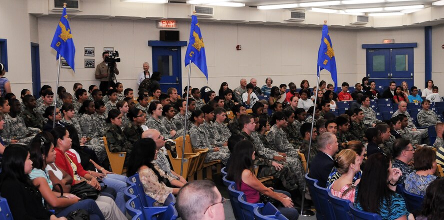 YOKOTA AIR BASE, Japan -- Cadets, teachers and parents await the beginning of the Yokota High School Junior Reserve Officer Training Corps change of command here Sept. 22. The ceremony was held to change the command of the Yokota cadets from one commander to another as well as from the Army JROTC program to the Air Force JROTC program. (U.S. Air Force Photo/Airman 1st Class Katrina R. Menchaca)