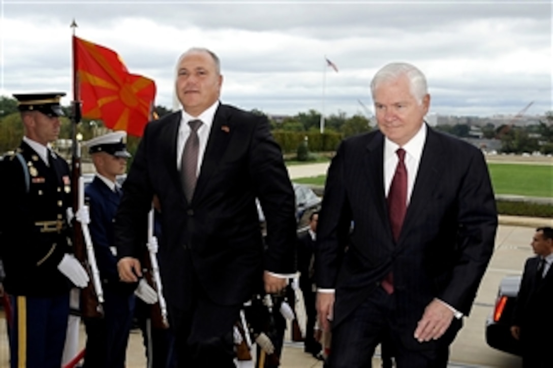 Secretary of Defense Robert M. Gates escorts Macedonian Defense Minister Zoran Konjanovski through an honor cordon and into the Pentagon on Oct. 4, 2010.  