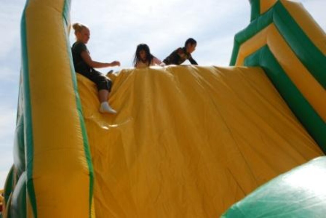 Supervising the local children over a simulated obstacle course at the Fuji Friendship Festival.