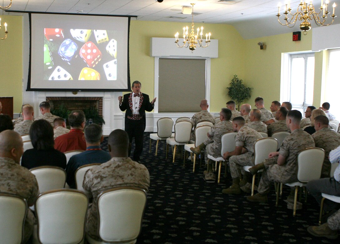 Ray “The Diceman” Semko gives an operational security brief aboard Marine Corps Base Camp Lejeune, N.C., Oct. 4, 2010. Semko uses the acronym D.I.C.E., meaning defensive information to counter espionage to teach about the importance and practice of operational security.