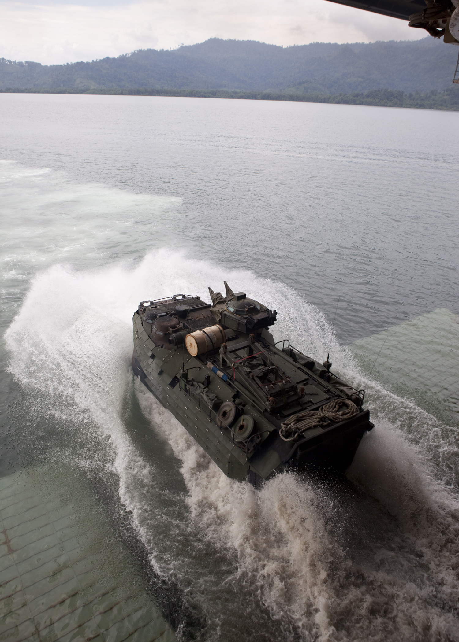 An amphibious assault vehicle, with Company A, 2nd Assault Amphibian Battalion, attached to Special-Purpose Marine Air-Ground Task Force Continuing Promise 2010, launches from the well deck of the amphibious assault ship USS Iwo Jima (LHD7), during demonstrations for service members and civilians, off the coast of Chiriqui Grande, Panama, Oct. 5. Service members and civilians are deployed in support of CP10 providing medical, dental, veterinary, engineering assistance and subject-matter exchanges to Caribbean, Central and South American nations.