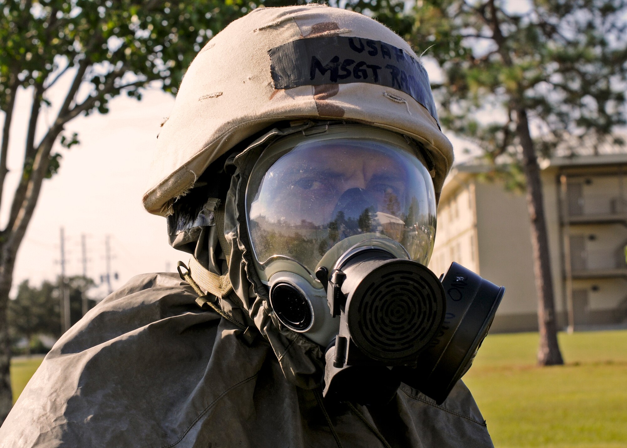A master sergeant from the 919th Special Operations Wing monitors the decontamination stations before sending another group through during Day two of the wing’s Ability to Survive and Operate exercise, Oct. 3 at Duke Field, Fla.  The Reserve unit exercised preparing deployers, Mission Oriented Protective Posture and command and control procedures during the Unit Training Assembly weekend.  (U.S. Air Force photo/Tech. Sgt. Samuel King Jr.)