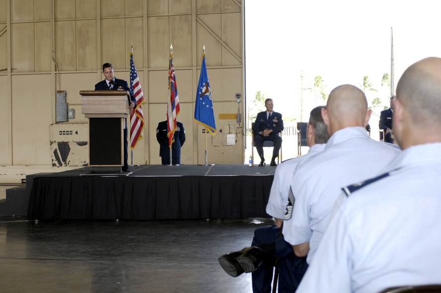 Colonel William G. Routt, 3rd Operations Group commander from Joint Base Elmendorf-Richardson, Alaska, speaks to attendees during the 19th Fighter Squadron Realignment and Assumption of Command ceremony Oct. 4 at Joint Base Pearl harbor Hickam, Hawaii. The 19th FS will once again call Hawaii home as it spent 1923-1944 in the Hawaiian territories, including assignments at Wheeler Army Airfield, Bellows Army Airfield and Barbers Point. (Photo by David D. Underwood, Jr.)