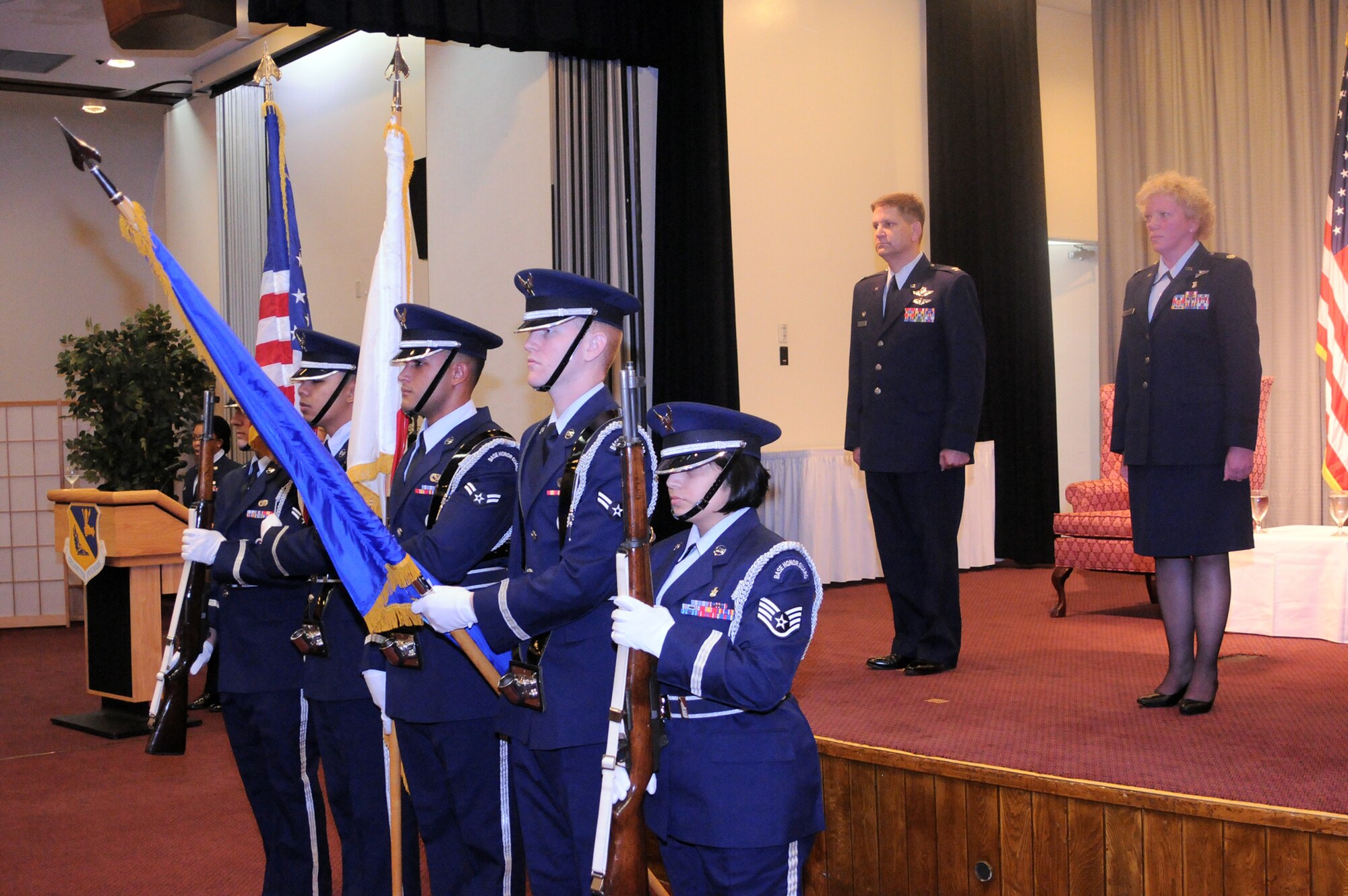 YOKOTA AIR BASE, Japan -- Yokota's Honor Guard presents the colors before the begining of the 374th Medical Operations Squadron assumption of command here Oct. 5. Lt. Col. Mary O'Loughlin joined team Yokota as the new commander of the 374th MDOS. (U.S. Air Force Photo/ Airman 1st Class Katrina R. Menchaca)