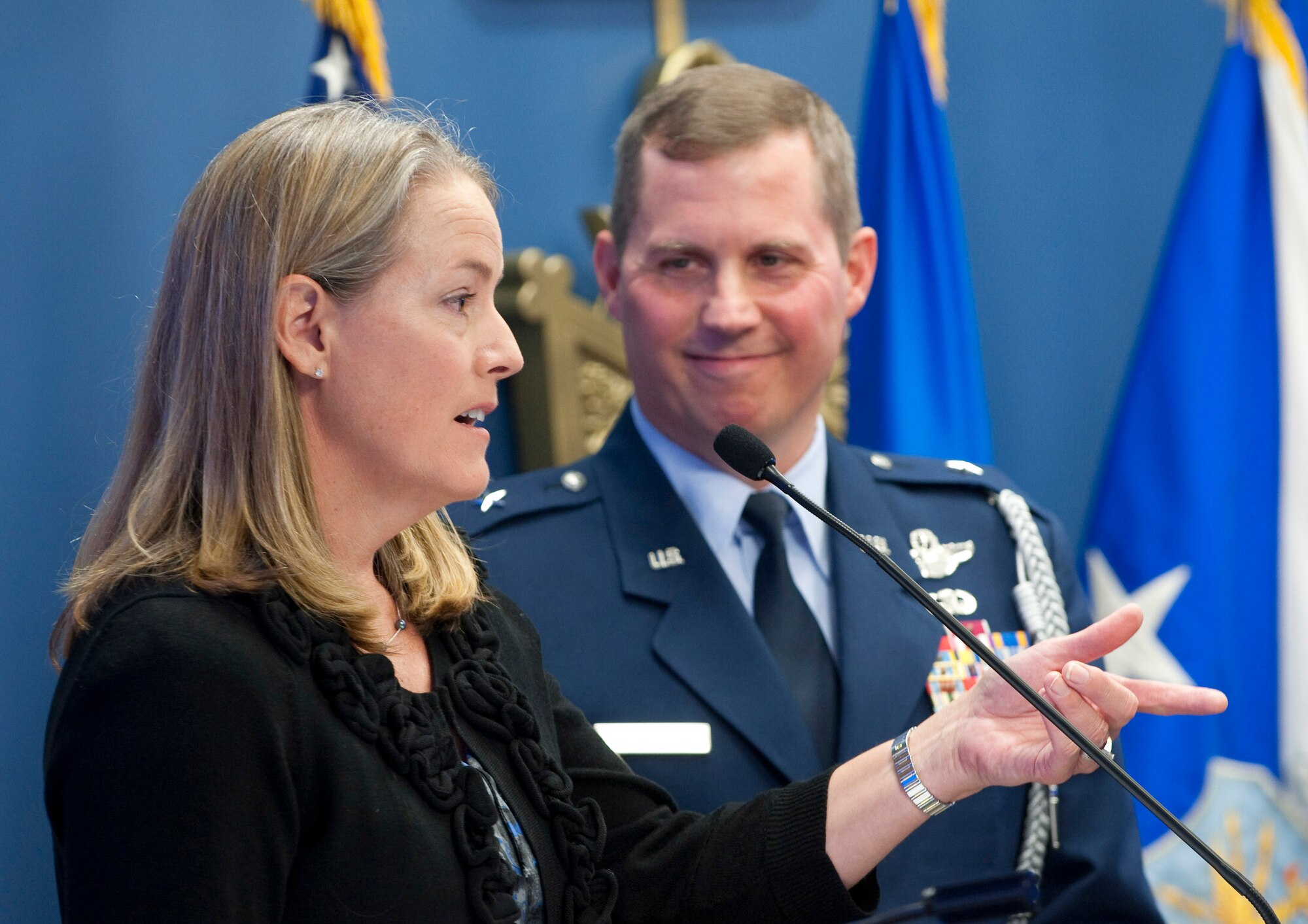 Brig. Gen. Thomas W. Bergeson looks on as his wife Pamela talks about winning the 2010 General and Mrs. Jerome F. O'Malley award. Air Force Chief of Staff Gen. Norton Schwartz presented the award during a ceremony in the Pentagon Oct. 4, 2010. The award is presented annually to the wing commander and spouse team who have best exhibited their own courage, power, grace and beauty in caring for Air Force families. The award was established after the O'Malleys, who were known for their leadership and contributions to Air Force families and communities, were tragically killed in a plane crash in 1985. (U.S. Air Force photo/Jim Varhegyi)