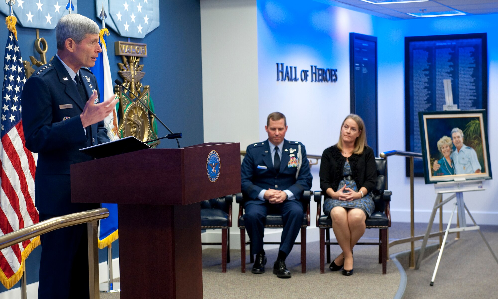 Air Force Chief of Staff Gen. Norton Schwartz (left) introduces Brig. Gen. Thomas W. Bergeson and his wife Pamela during a ceremony in the Pentagon Oct. 4, 2010, prior to presenting them with the General and Mrs. Jerome F. O'Malley award. The award is presented annually to the wing commander and spouse team who have best exhibited their own courage, power, grace and beauty in caring for Air Force families. The award was established after the O'Malleys, who were known for their leadership and contributions to Air Force families and communities, were tragically killed in a plane crash in 1985. (U.S. Air Force photo/Jim Varhegyi)