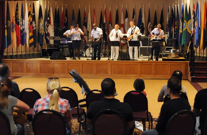 Live musical entertainment was provided at the Joint Base Charleston open house at the Red Bank Club on JB CHS-Weapons Station, S.C., Oct. 1, 2010. Guests enjoyed sounds from the U.S. Air Force Blue Aces with special guests from the U.S. Navy Fleet Forces band, as well as a local reggae band during the event. (U.S. Air Force photo/Senior Airman Timothy Taylor)