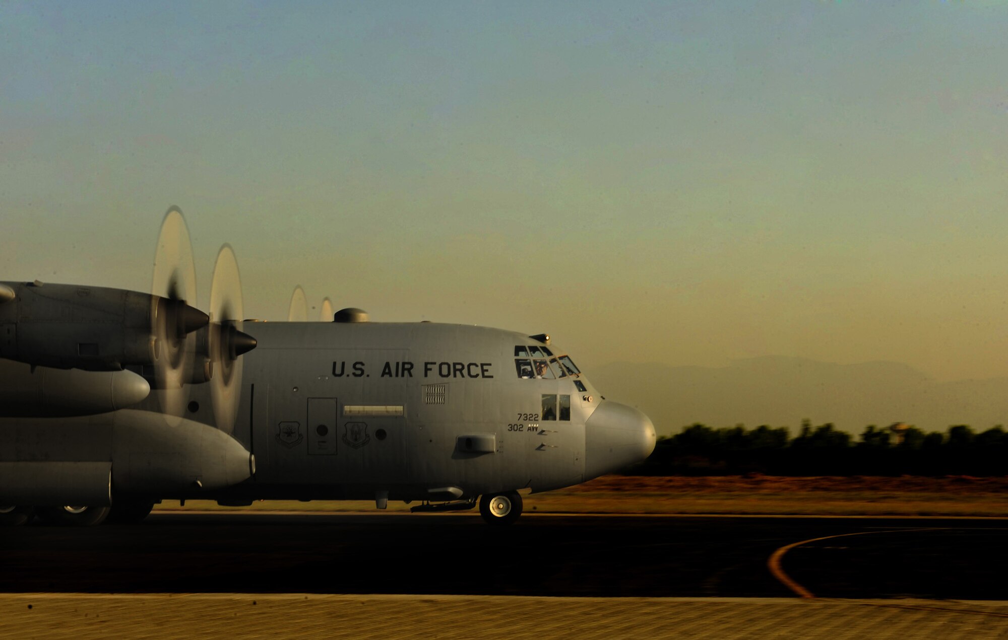 An Air Force Reserve C-130 Hercules takes off Oct. 3 from Pakistan Air Force Base Chaklala carrying pallets of flood relief supplies to Skardu Airport in northern Pakistan. The mission, flown by 302nd Airlift Wing aircrews from Peterson Air Force Base, Colo., who are deployed to Southwest Asia in support of U.S. Central Command operations, was one of the last fixed-wing operations supporting flood relief in Pakistan. Between Aug. 16 and Oct. 3, C-130 Hercules and C-17 Globemaster III aircraft and their aircrews transported nearly 6 million pounds of much-needed relief supplies to Pakistan aid distribution centers throughout the country. (U.S. Air Force photo/Staff Sgt. Andy Kin)
