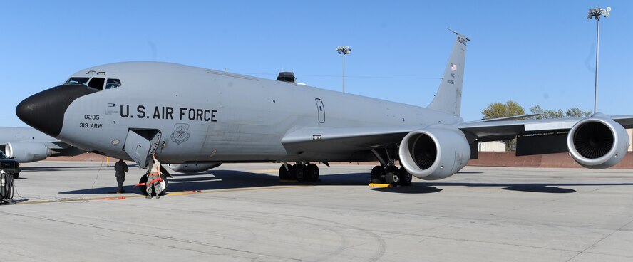 Airmen from the 319th Aircraft Maintenance Squadron, begin work on a KC-135 Stratotanker after it landed at Grand Forks Air Force Base, Oct. 4 from a deployment in support of Operation Enduring Freedom. This tanker was the last deployer from Grand Forks AFB due to the base’s transition from an aerial refueling mission to a remotely piloted aircraft mission. (U.S. Air Force photo by Staff Sgt. Suellyn Nuckolls)
