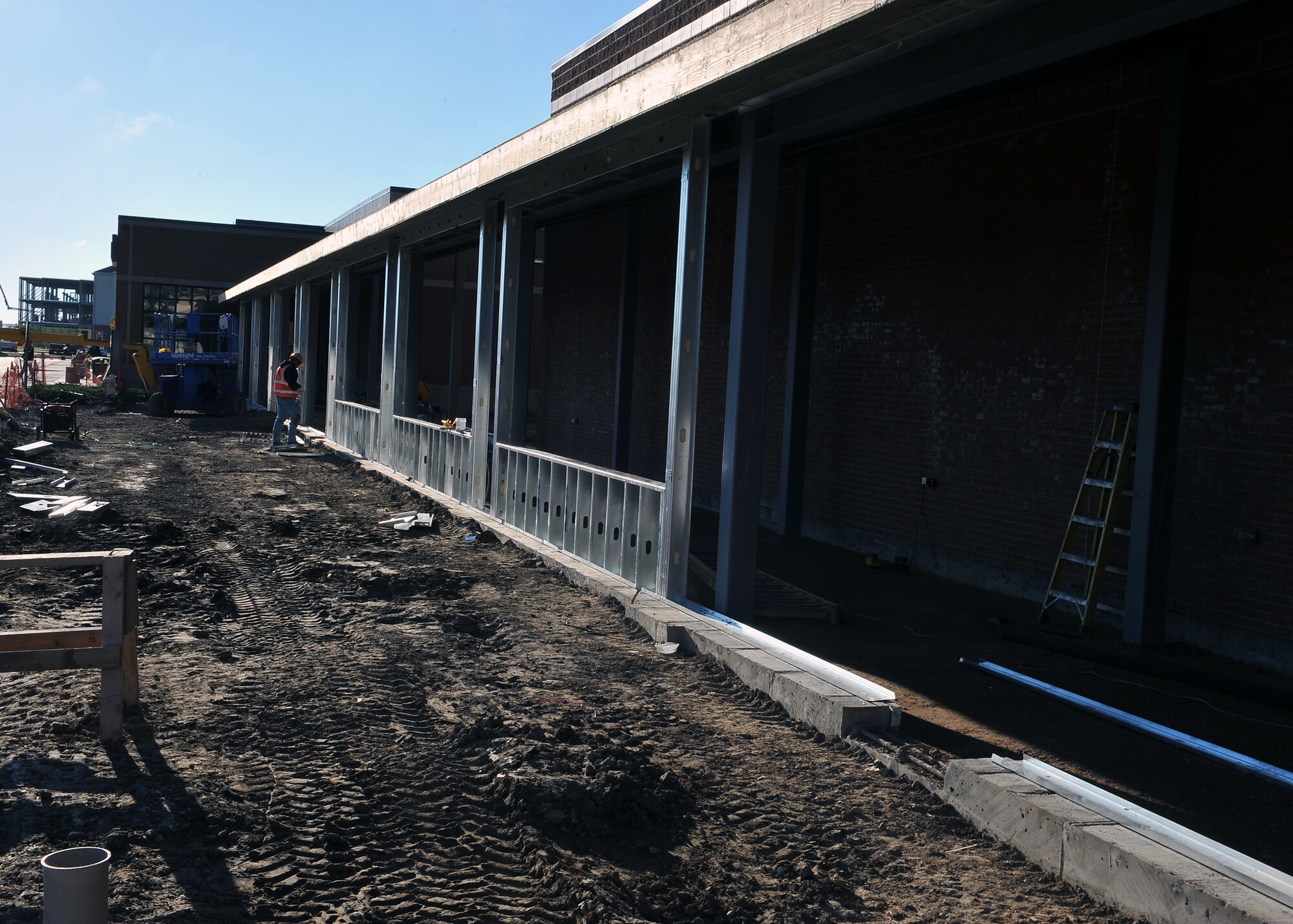 MINOT AIR FORCE BASE, N.D. -- Construction is under way with a breezeway connecting the Base Exchange and Commissary here Oct. 1. The breezeway’s projected completion is slated for mid-December, providing a safe passageway between the two buildings for those harsh winter months. Construction projects like this are a continuing effort to improve living standards for Air Force Global Strike Command Airmen at Minot. (U.S. Air Force photo by Senior Airman Michael J. Veloz)