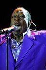 MINOT, N.D. -- Joe Herndon, of the Temptations, performs for the Norsk Hostfest at the N.D. State Fair Grounds here Sept. 30. Celebrating its 33rd year in service to the Scandinavian culture, the festival provides a fun, family atmosphere for Air Force Global Strike Command Airmen to rest and relax among peers, friends and fellow community members. (U.S. Air Force photo by Senior Airman Benjamin Stratton)