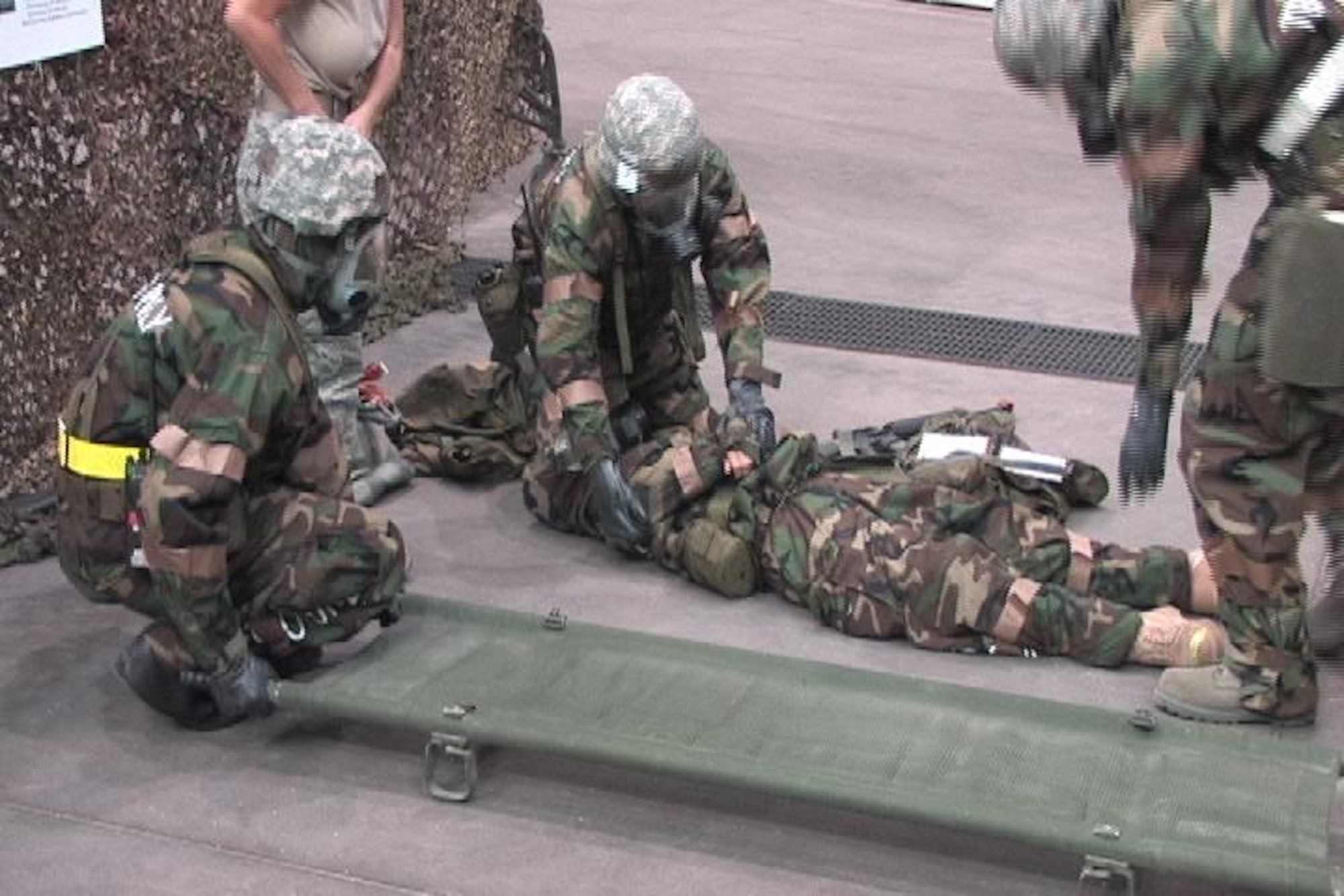 Members of the 161st Air Refueling Wing aircraft maintenance flight participate in an Ability to Survive and Operate, or ATSO, training facility in preparation for an upcoming Operational Readiness Exercise and Operational Readiness Inspection in a hanger at Phoenix Sky Harbor Air National Guard Base. (Image by Airman 1st Class Joshua Morrison)