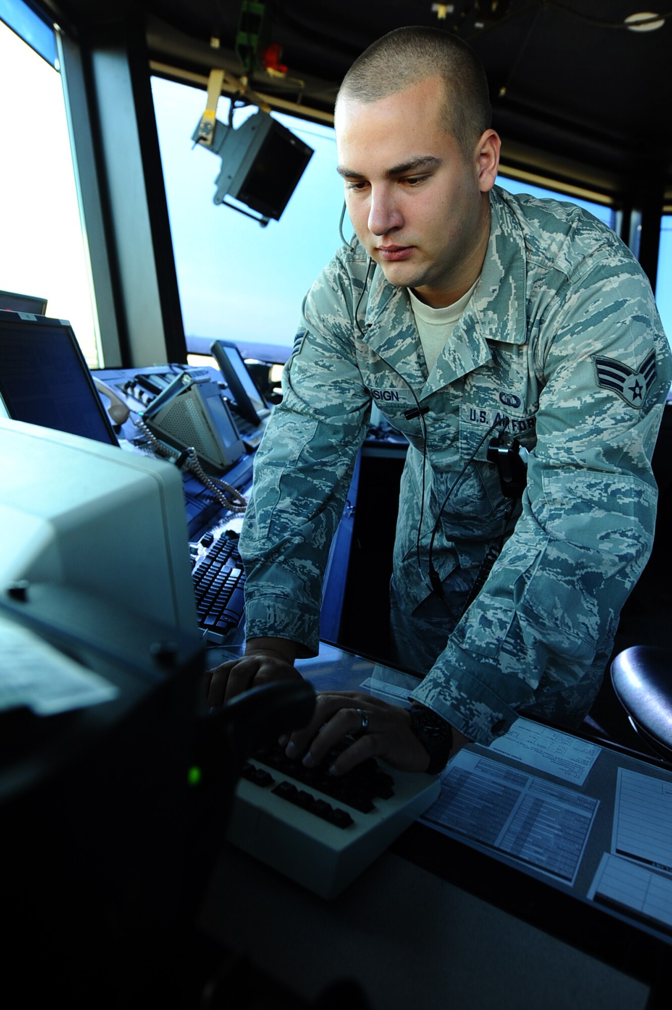 ELLSWORTH AFB, S.D. – Senior Airman Mark Ensign, 28th Operations Support Squadron air traffic controller journeyman, make adjustments to flight plans in order to assist an aircraft, Sept. 30. Air traffic controllers ensure the orderly and expeditious flow of aircraft both on the airfield and in the air. (U.S. Air Force photo/Senior Airman Kasey Close)