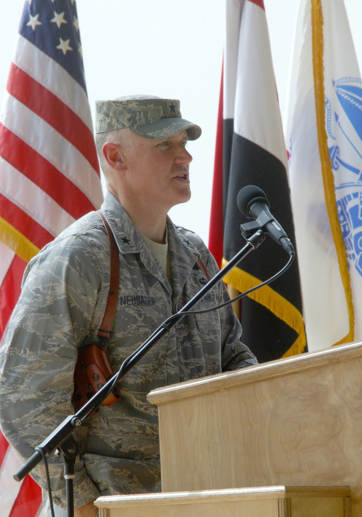 Brig. Gen. Kurt Neubauer, 332nd Air Expeditionary Wing commander, addresses the audience after assuming command Oct. 5, 2010, Joint Base Balad, Iraq.  “Today we celebrate the past, take pride in our team and focus on our future.  We take pride in our strong Iraqi and American teamwork to face our challenges, and we will focus on transferring JBB back to the government of Iraq." Gen. Neubauer was the commander of the 56th Fighter Wing, Luke Air Force Base, Ariz. (U.S. Air Force photo/Senior Master Sgt. Thomas Wood)