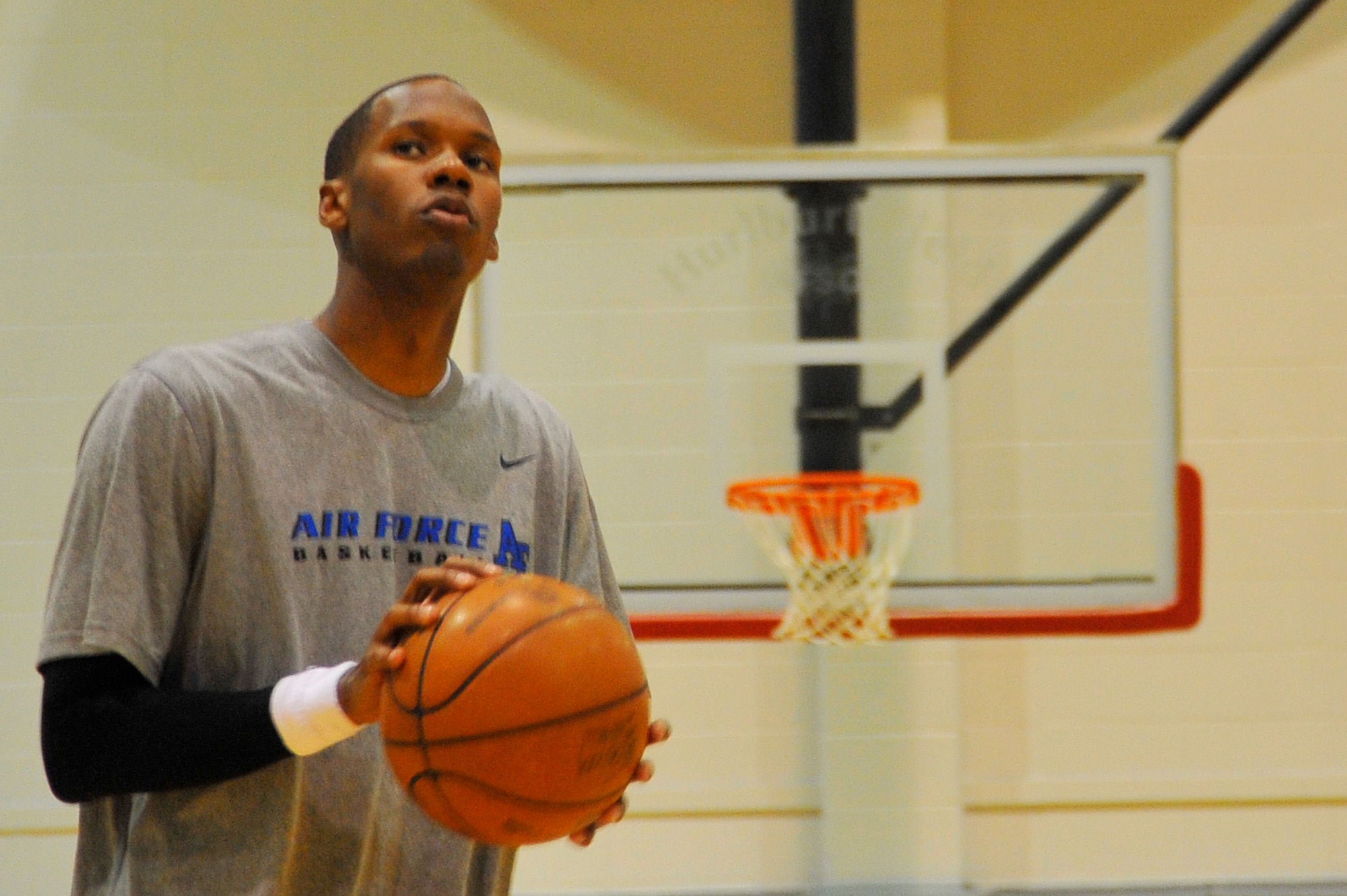 U.S. Air Force Capt. Antoine Hood, 919th Special Operations Wing, prepares to shoot during a workout session with the Miami HEAT coaches at Hurlburt Field, Fla., Sept. 29, 2010. Captain Hood had a college basketball career at the Air Force Academy from 2002-2006.  (DoD photo by U.S. Air Force Senior Airman Sheila deVera/RELEASED)


