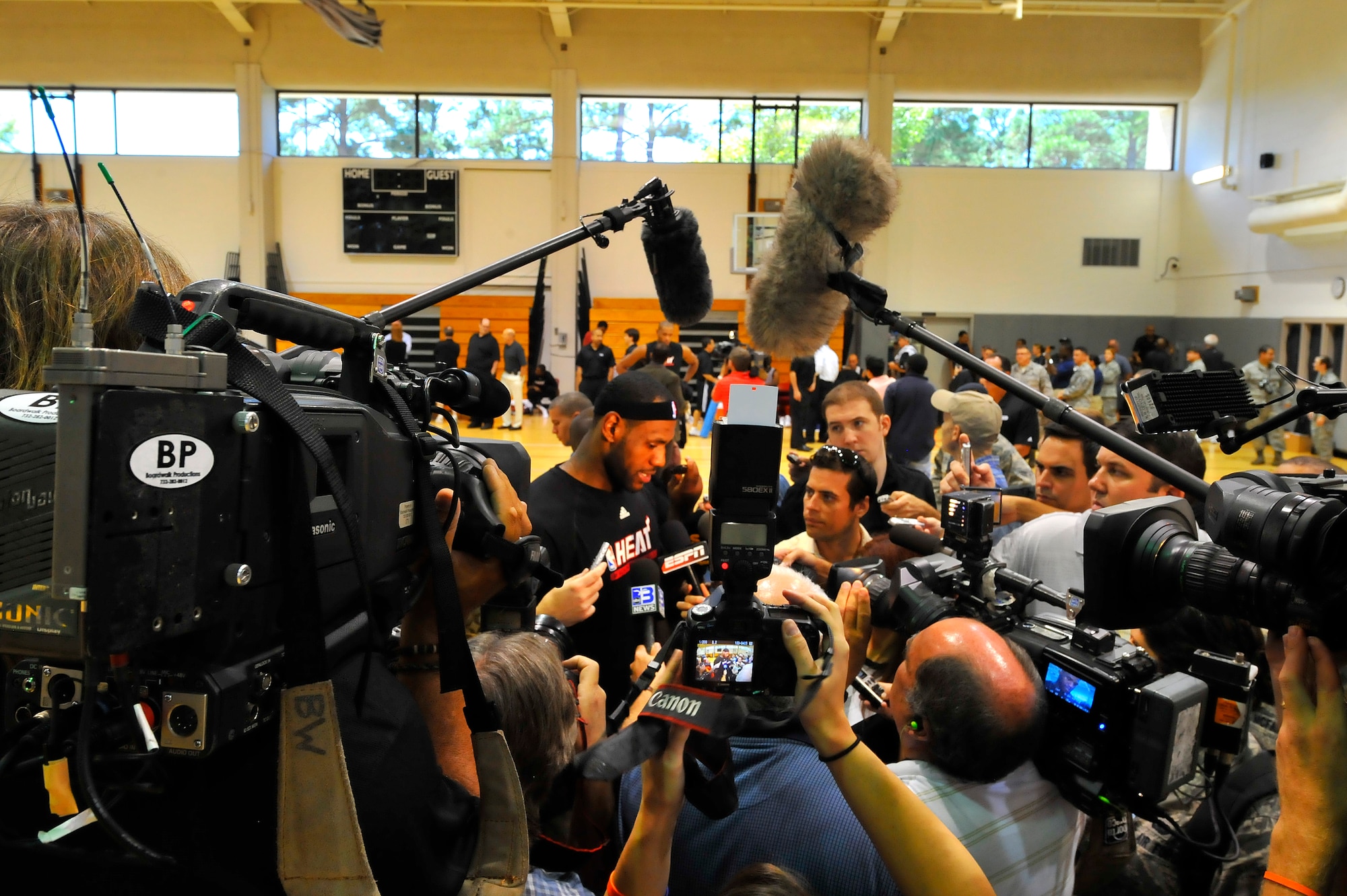 LeBron James, Miami HEAT forward, answers questions during a press
conference after a practice session at the Aderholt Fitness Center at Hurlburt Field, Fla., Sept. 29, 2010. The team requested the use of the fitness center for their week-long training camp, and 1st Special Operations Wing leadership agreed to support the visit. (DoD photo by U.S. Air Force Senior Airman Sheila deVera/RELEASED)
