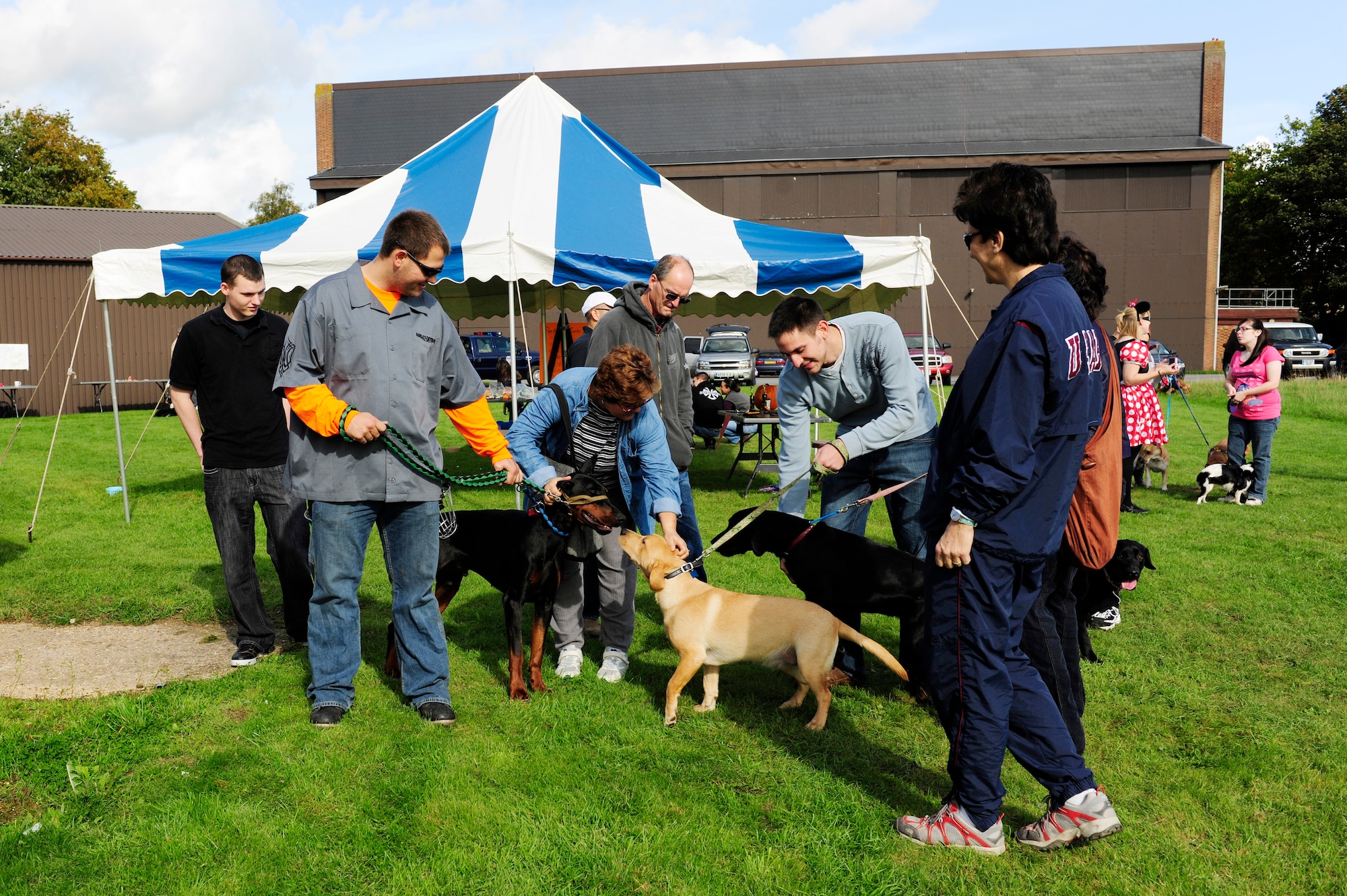 ROYAL AIR FORCE FELTWELL, England – Third Annual Pet Fest participants let their pets socialize Oct. 2.  More than 50 Airmen and families from RAFs Lakenheath, Mildenhall and Feltwell were in attendance at the Third Annual Pet Fest hosted by the RAF Feltwell Veterinary Clinic. Proceeds from the Pet Fest went to help support a local organization dedicated to the wellbeing of cats. (U.S. Air Force photo/Airman 1st Class Lausanne Morgan)